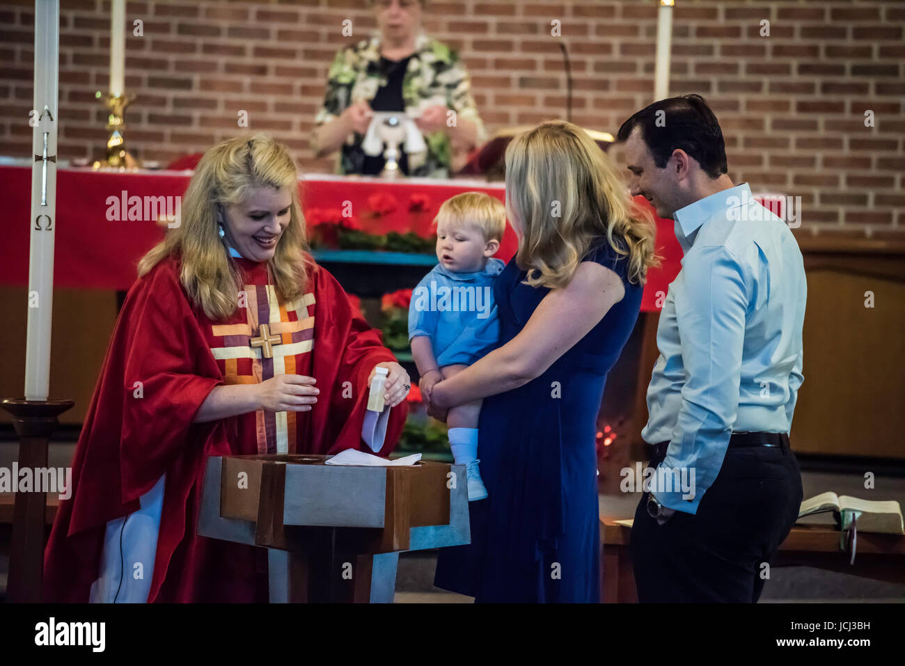 Church ceremony, baptism of young children. Parents, Grandparents ...