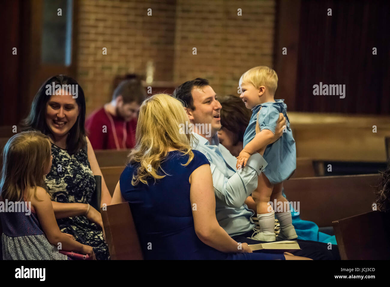 Church ceremony, baptism of young children. Parents, Grandparents ...