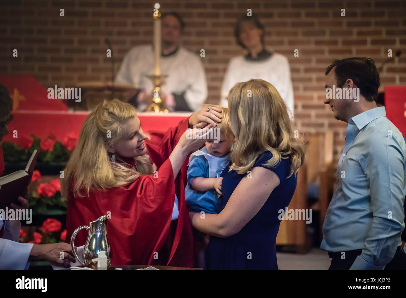 Church ceremony, baptism of young children. Parents, Grandparents ...