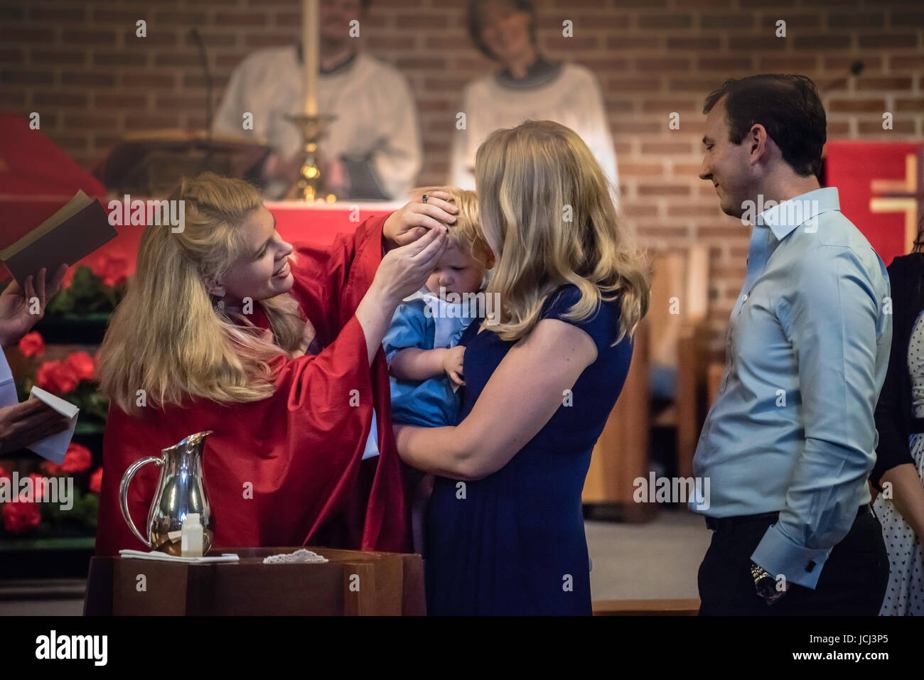 Church ceremony, baptism of young children. Parents, Grandparents ...