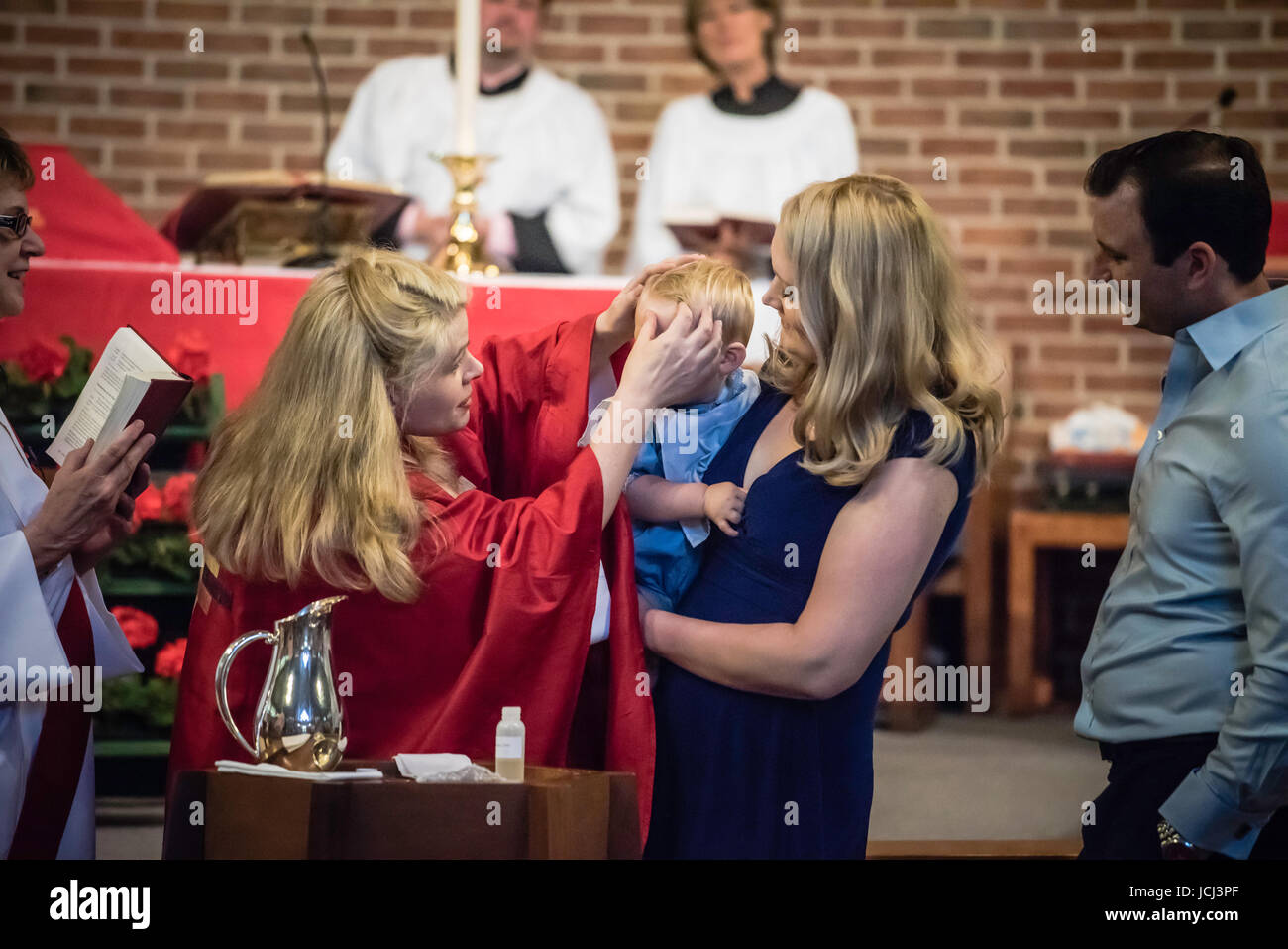Church ceremony, baptism of young children. Parents, Grandparents ...