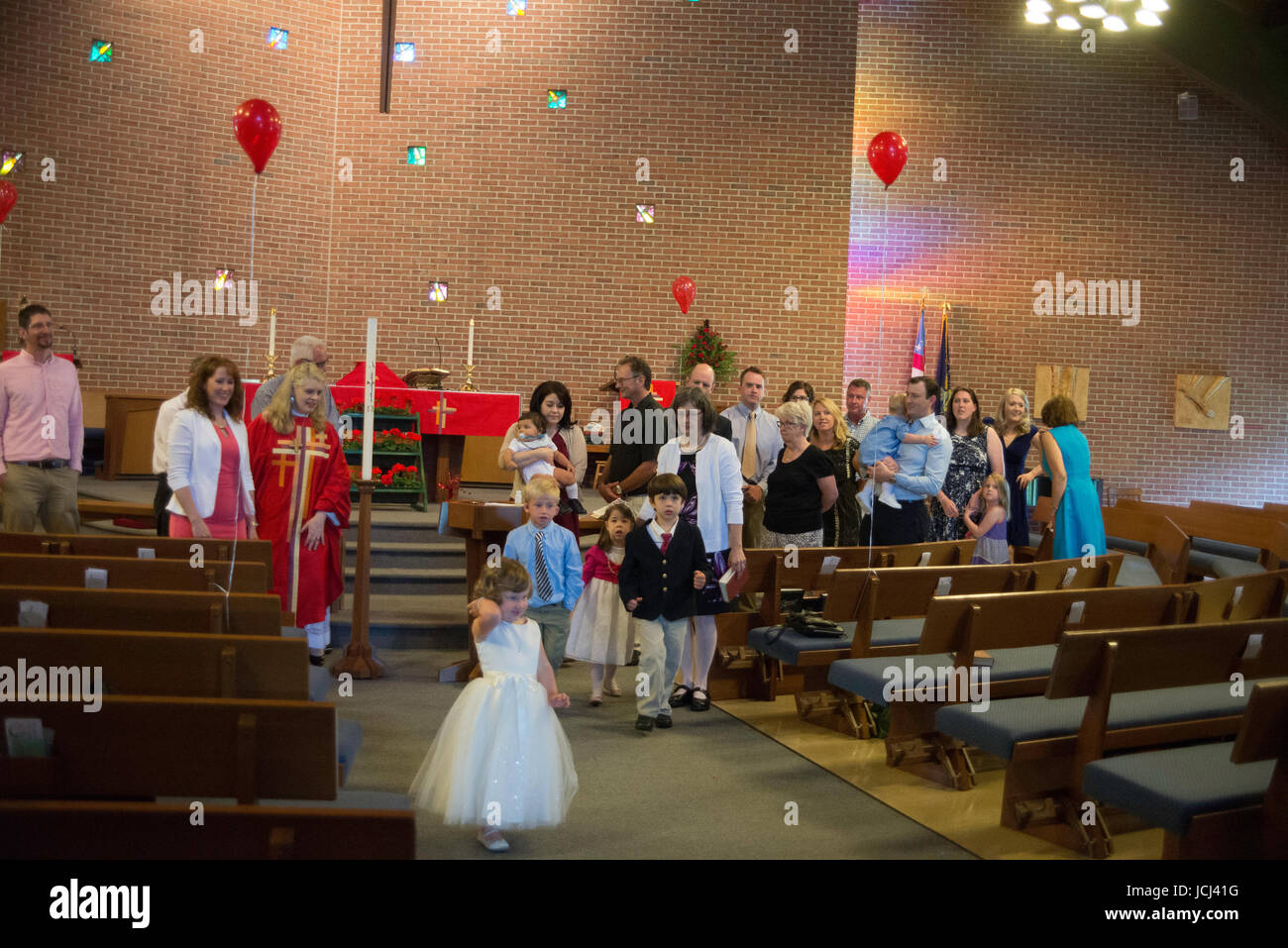 Church ceremony, baptism of young children. Parents, Grandparents ...