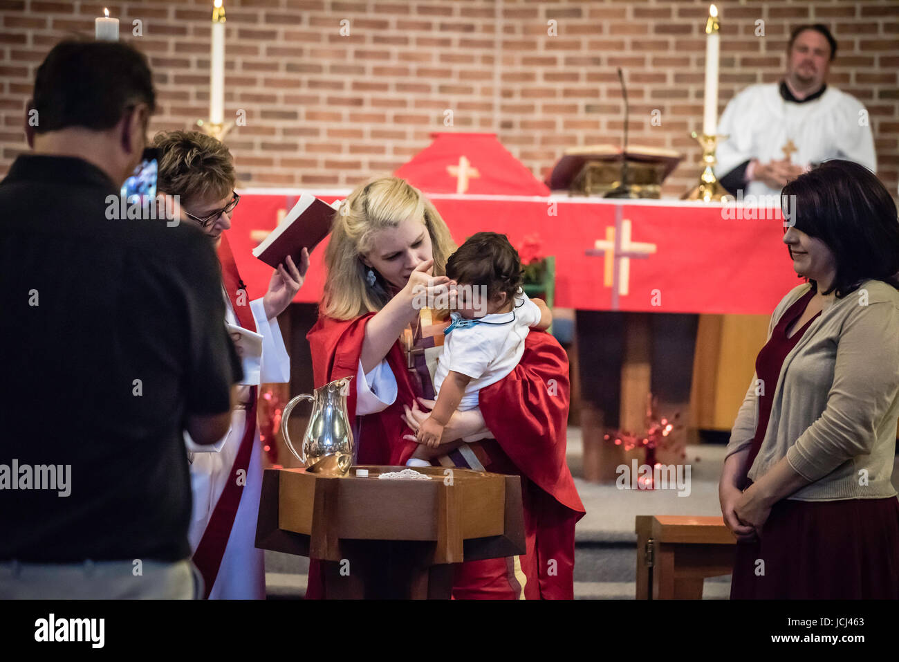 Church ceremony, baptism of young children. Parents, Grandparents ...
