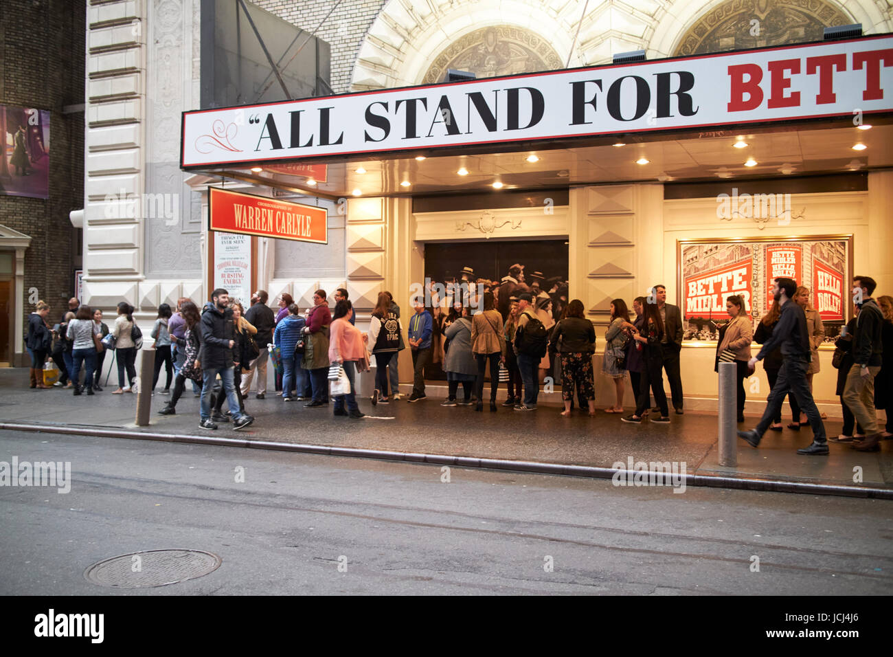 theater goers queue outside the schubert theatre before perfomance New York City USA Stock Photo