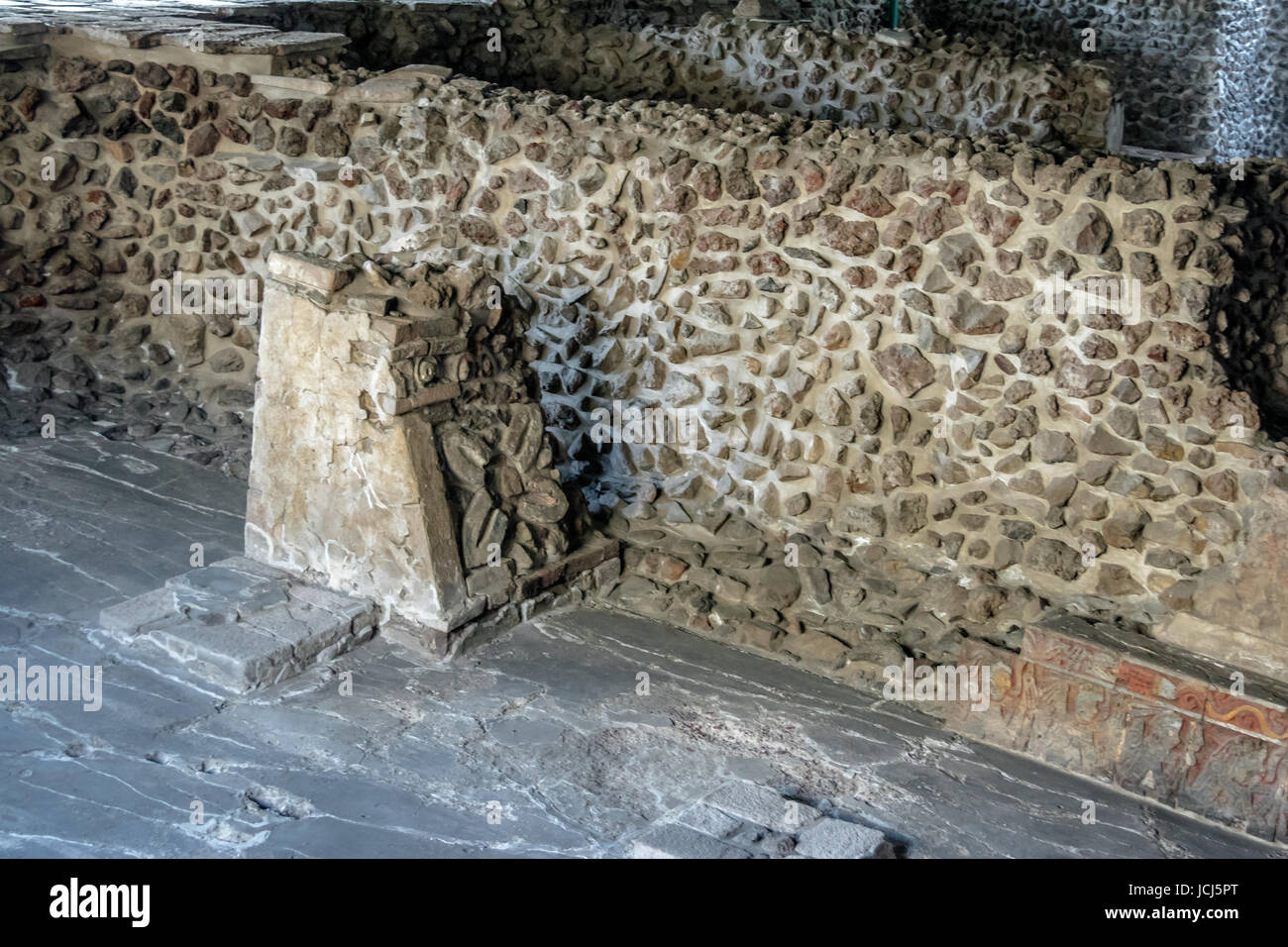 Four Petal Flower decoration carved in Stone Pillar of Aztec Temple (Templo Mayor) at ruins of Tenochtitlan - Mexico City, Mexico Stock Photo