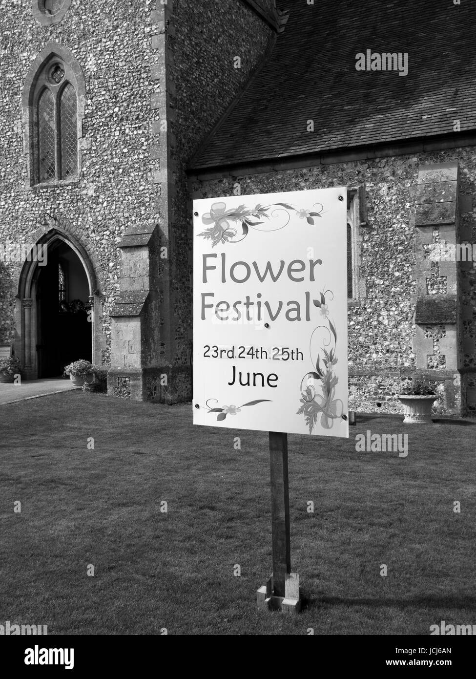 Saint Peter parish church in the Church of England diocese of Winchester, sign advertising local flower festival Stock Photo