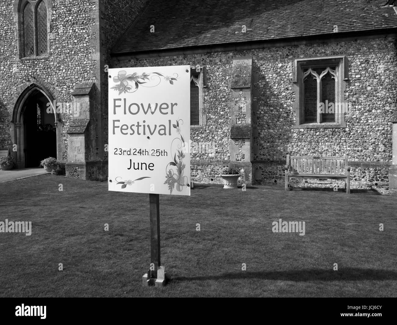 Saint Peter parish church in the Church of England diocese of Winchester, sign advertising local flower festival Stock Photo
