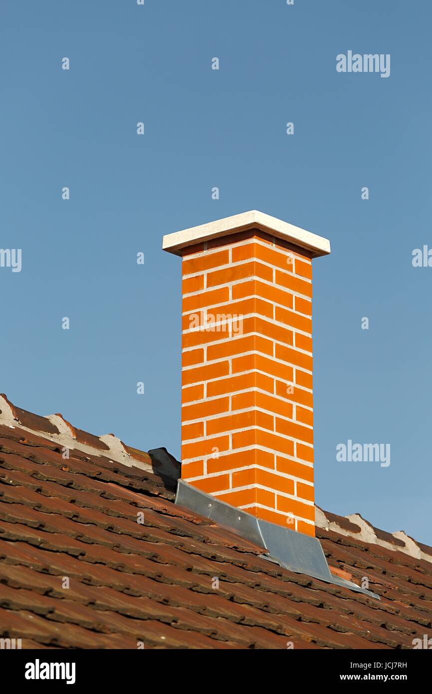 Chimney on a roof of a house Stock Photo - Alamy