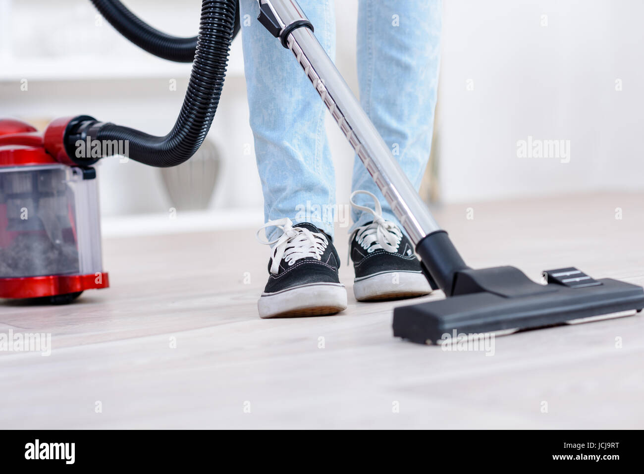 close up of male hoovering carpet Stock Photo Alamy