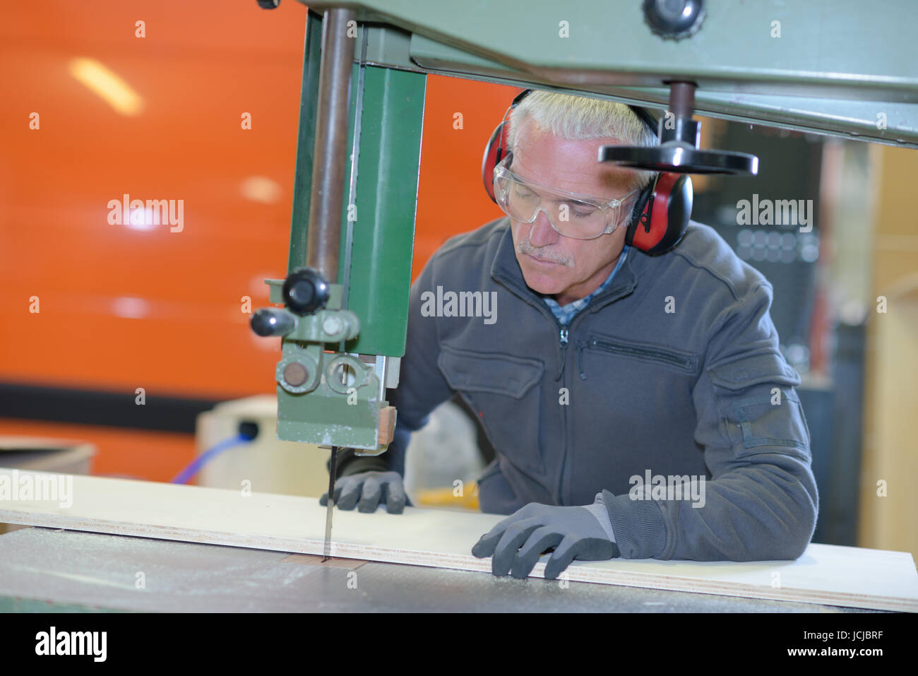 Old warehouse machine worker hi-res stock photography and images - Alamy