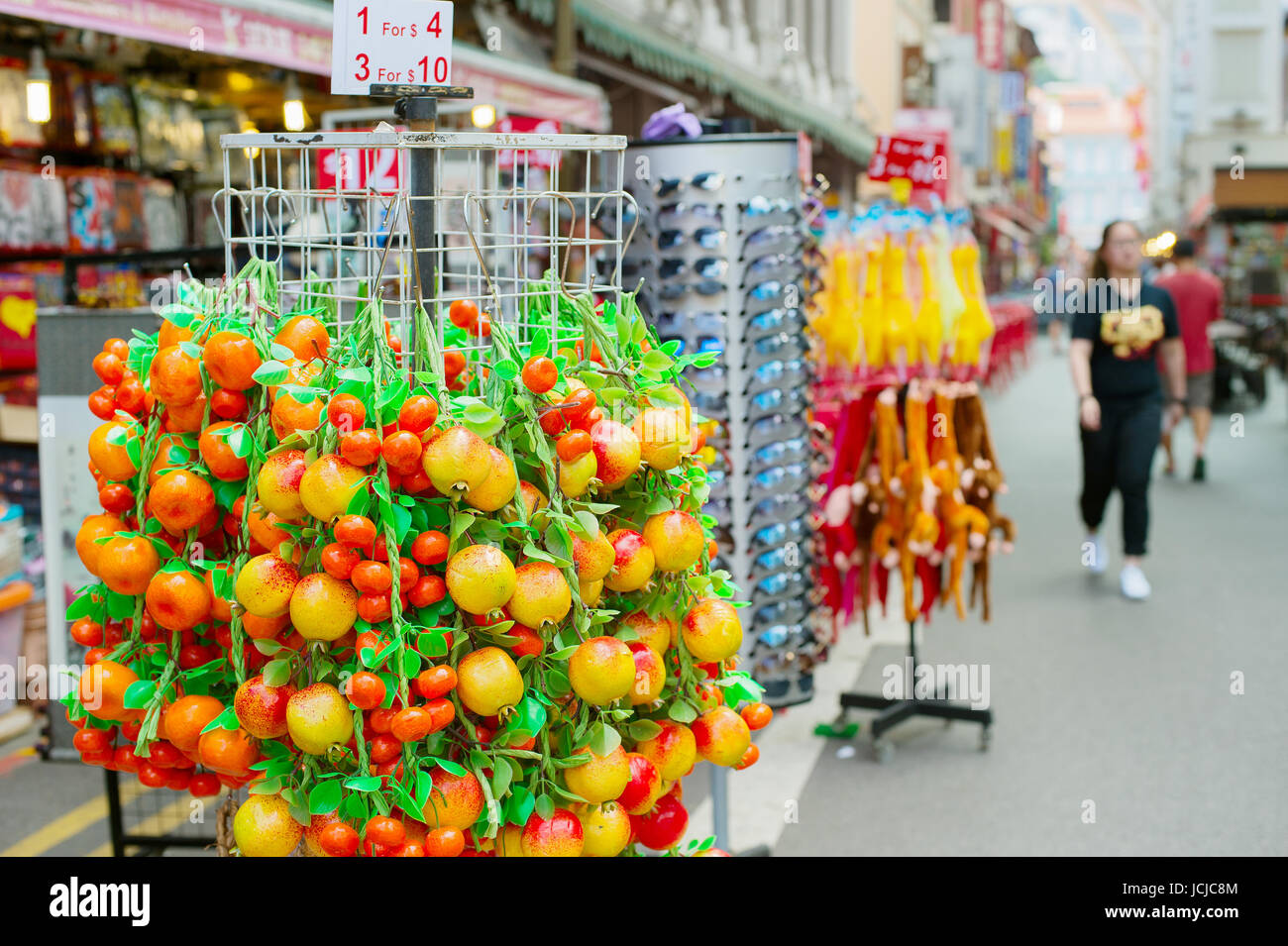 Artificial fruits for sale at Chinatown tourist market, Singapore Stock