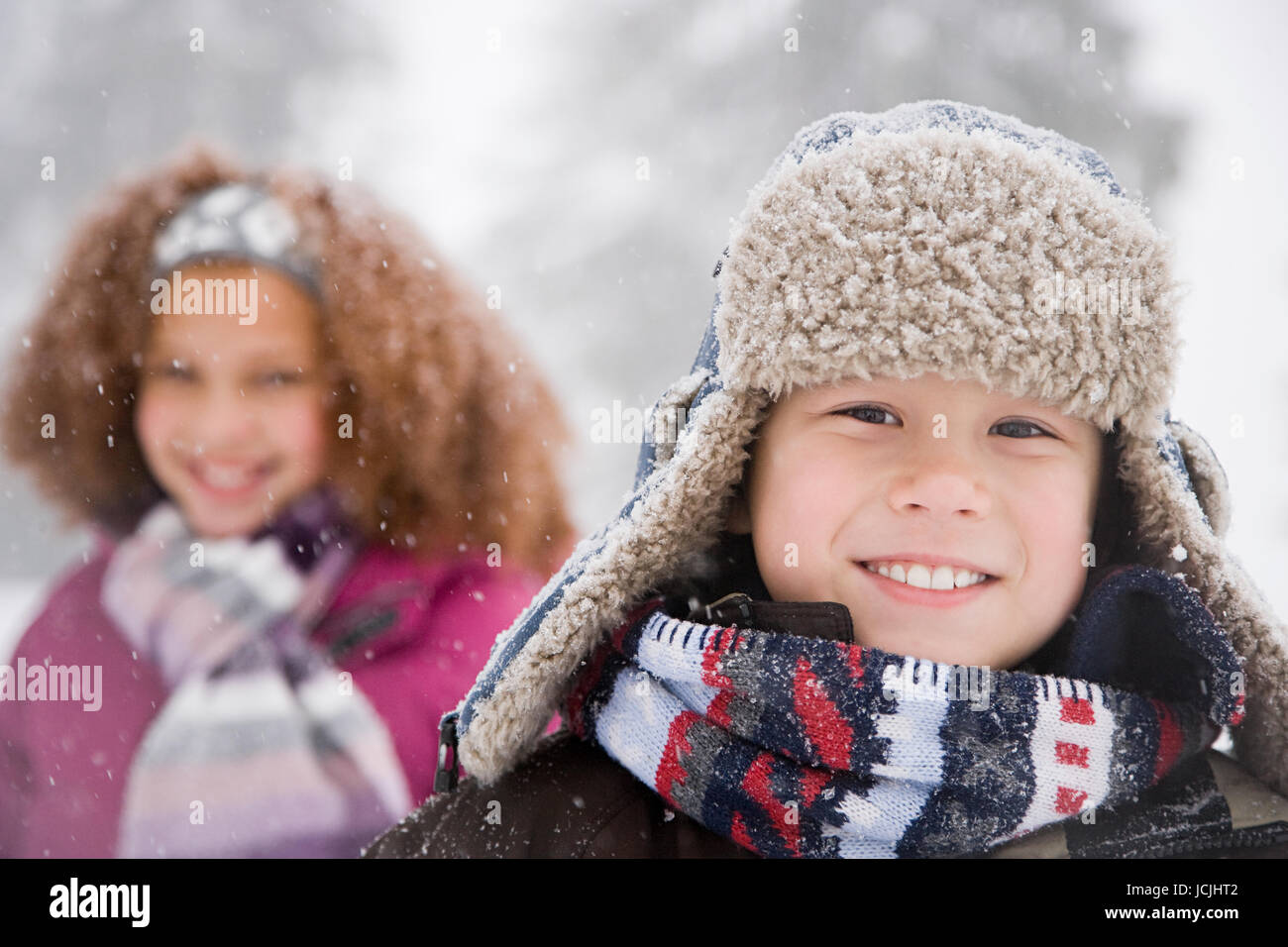 Children in the snow Stock Photo
