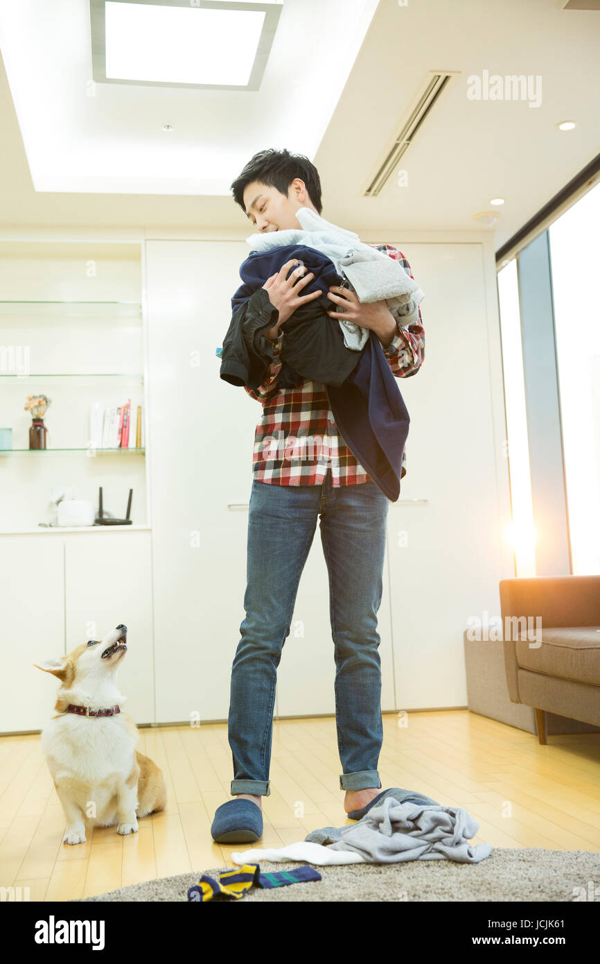 Lifestyle of young bachelor and his pet dog Stock Photo Alamy