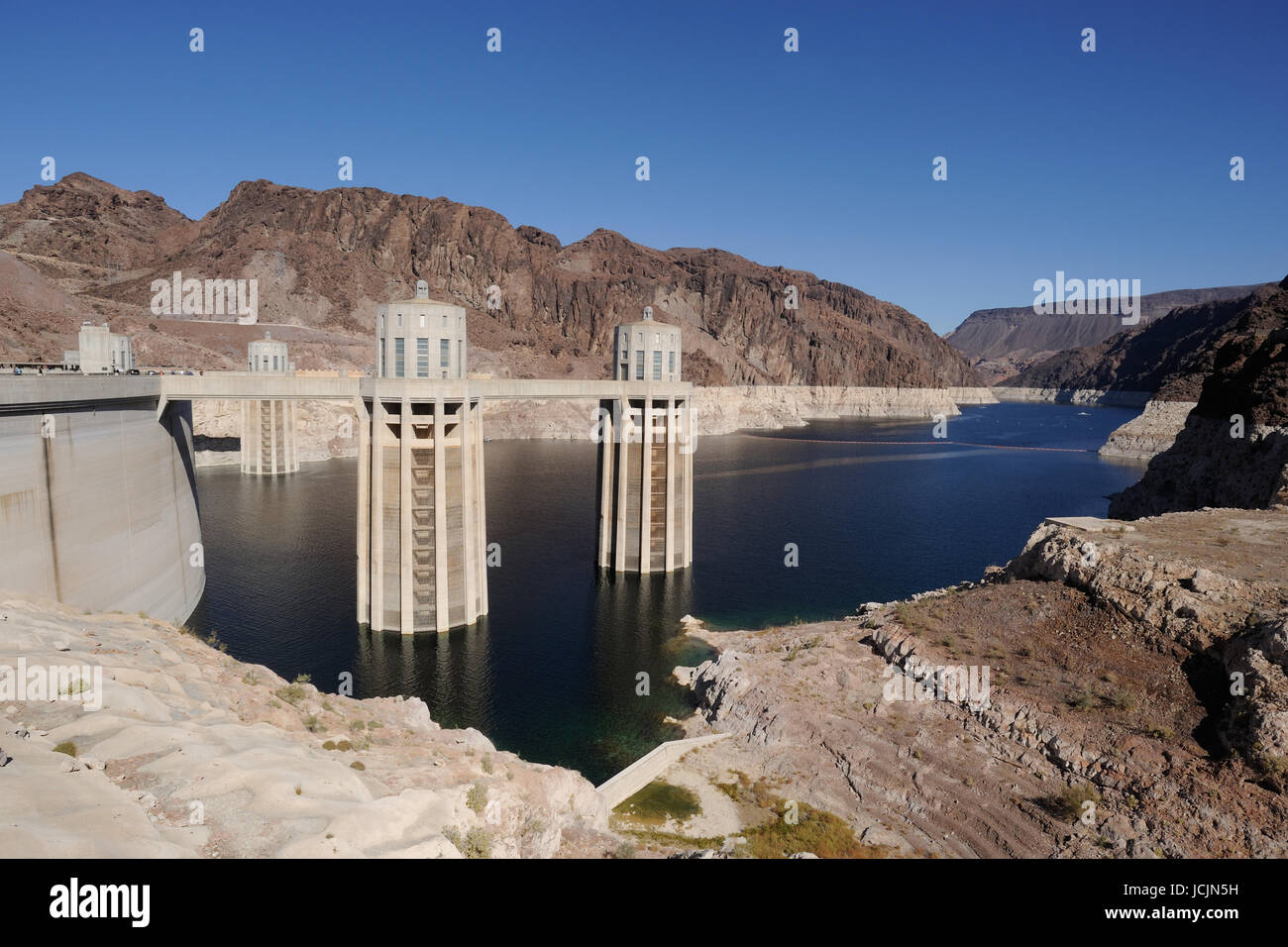 Hoover Dam on the Colorado River, Lake Mead. Penstock feed towers, USA Nevada border Stock Photo