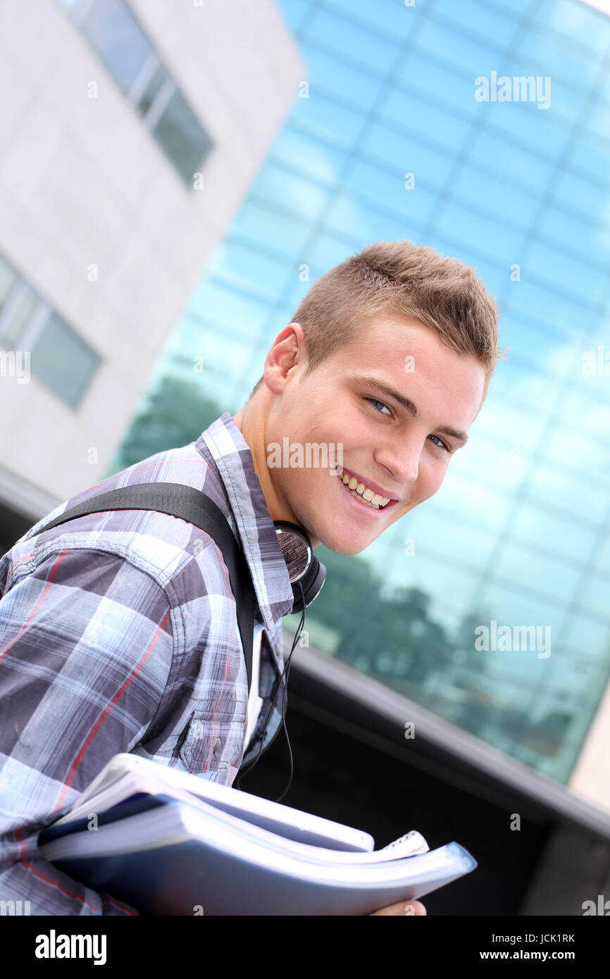 Portrait of cheerful student at college Stock Photo - Alamy