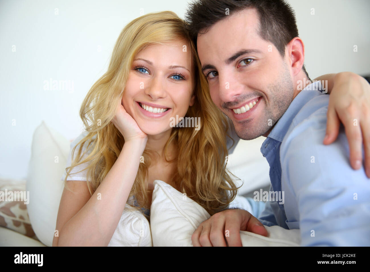 Cheerful in love couple at home Stock Photo - Alamy
