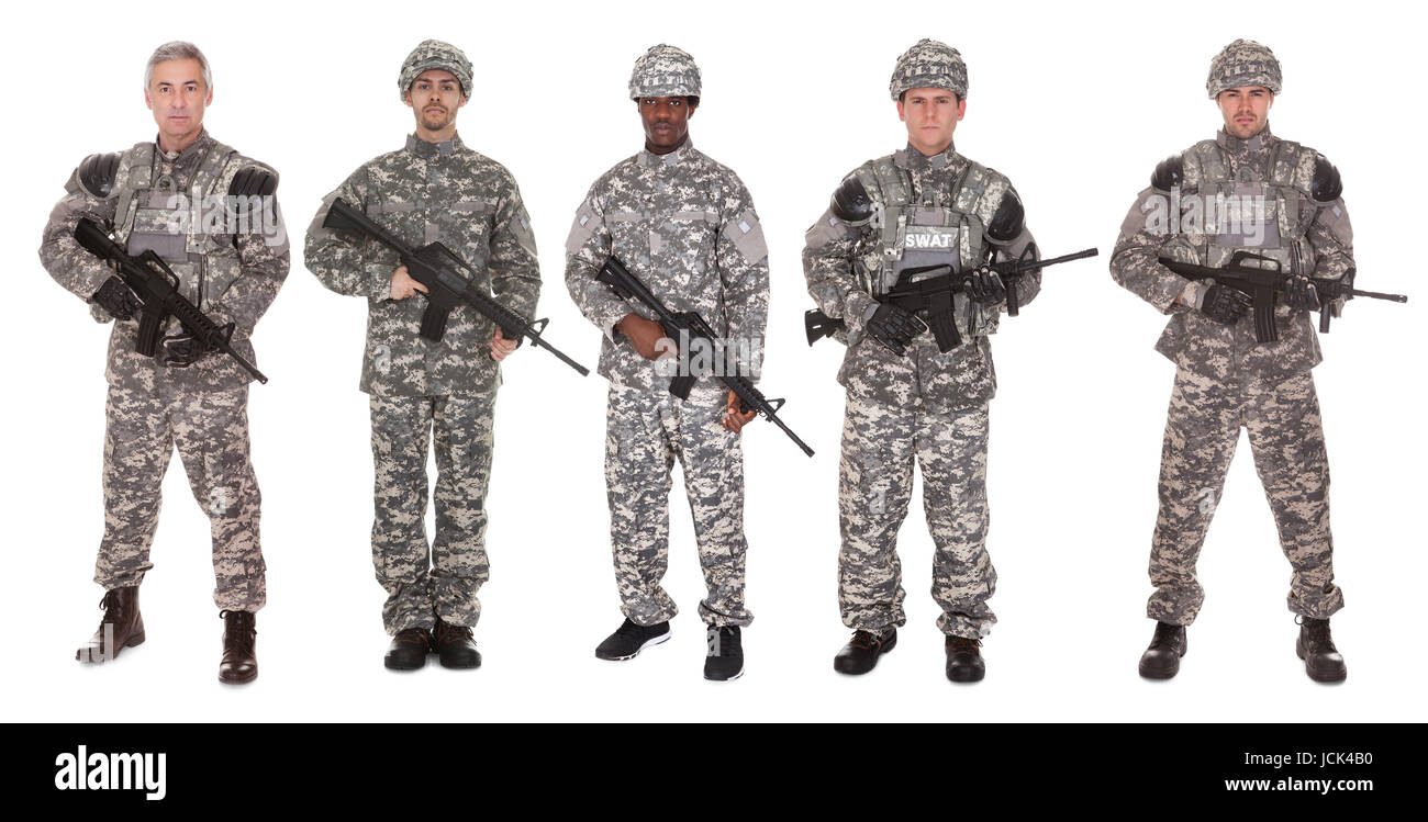 Group Of Soldier Holding Rifle Over White Background Stock Photo