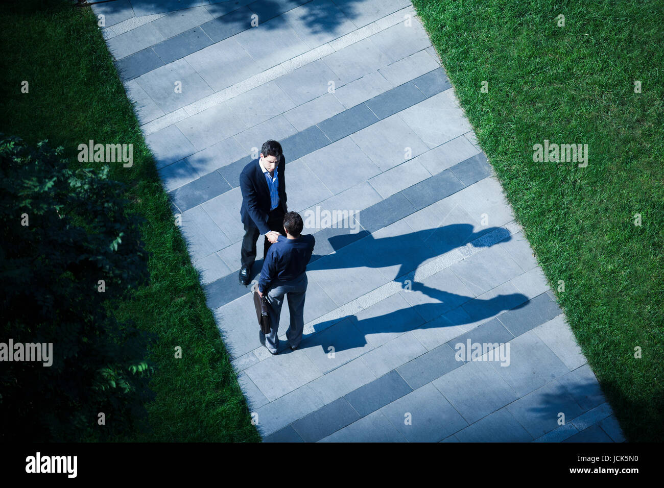 Business handshake aerial hi-res stock photography and images - Alamy