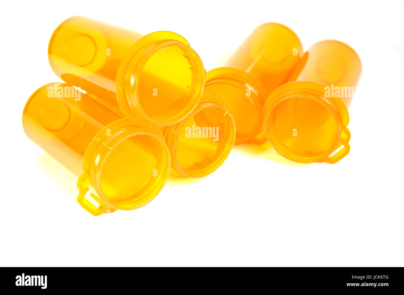 Empty medicine bottles isolated on white background. Refill