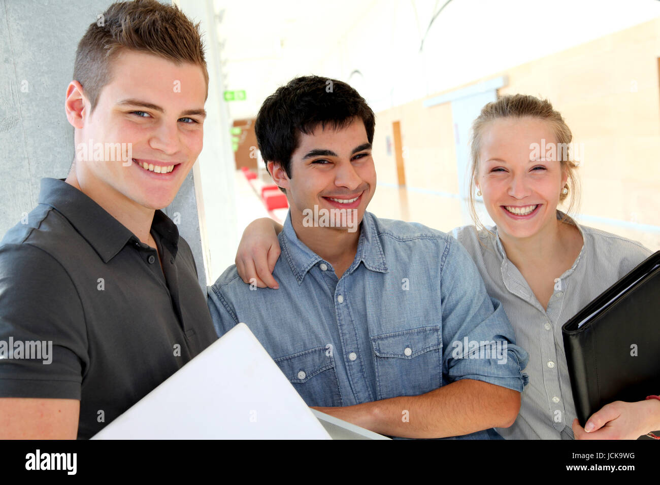 Portrait of students in school corridor Stock Photo - Alamy