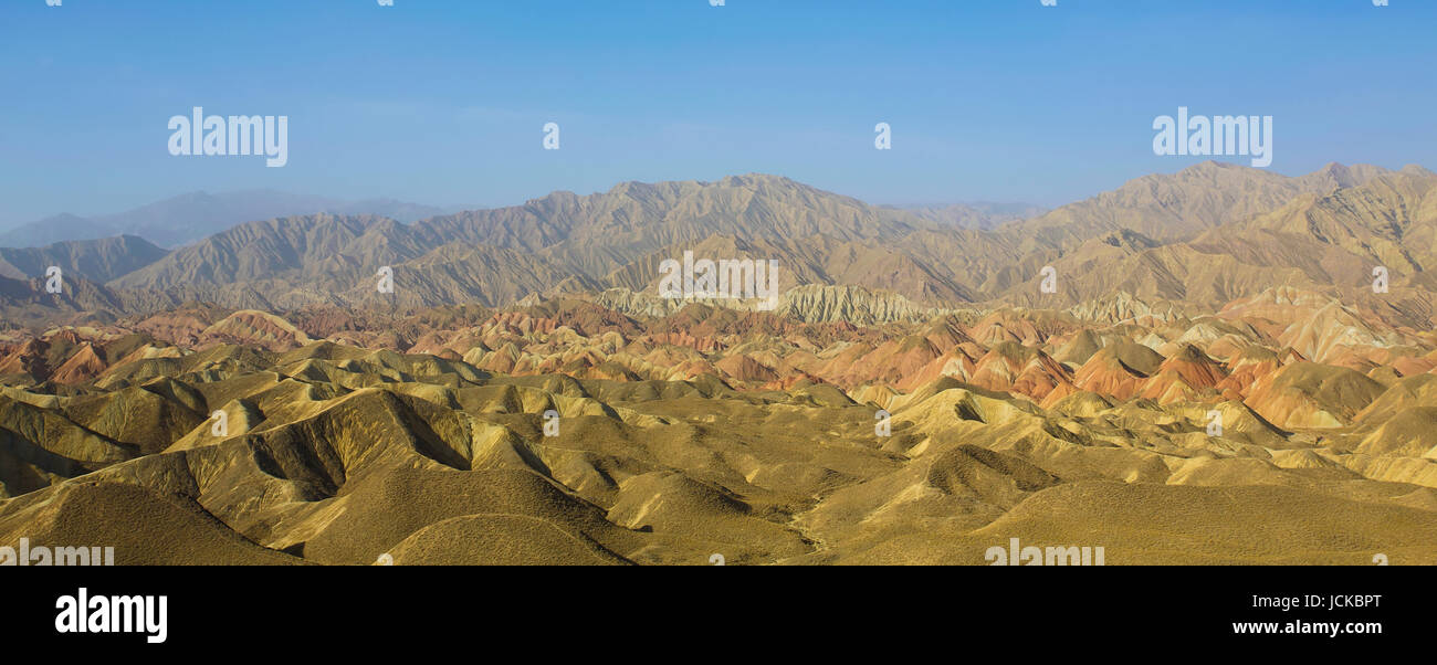 Yellow sandstone hills in desert with clear blue sky , Scenery in Tibet . Stock Photo