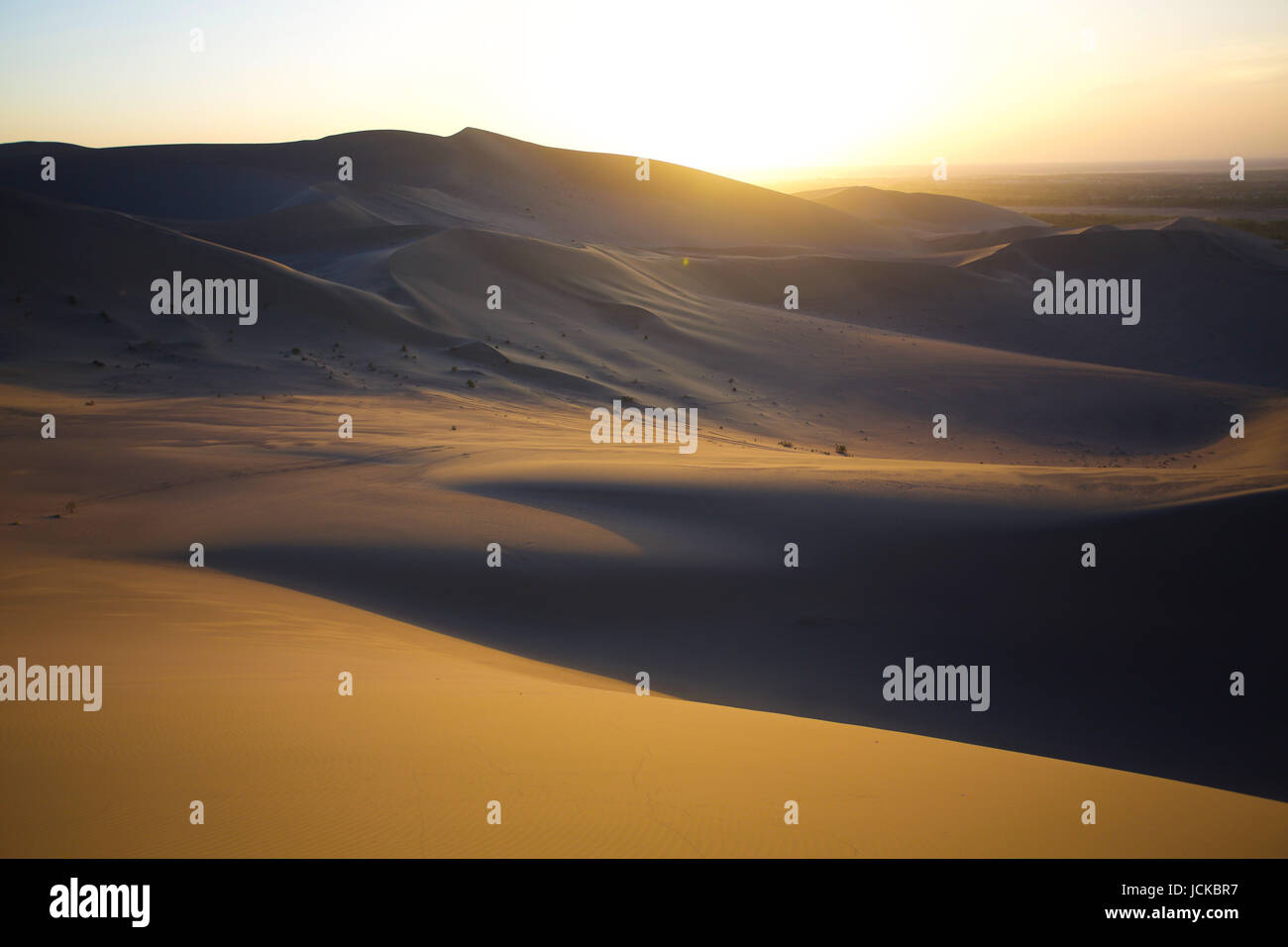 Tranquil yellow sand desert  , sunset scene ,Scenery in Tibet . Stock Photo