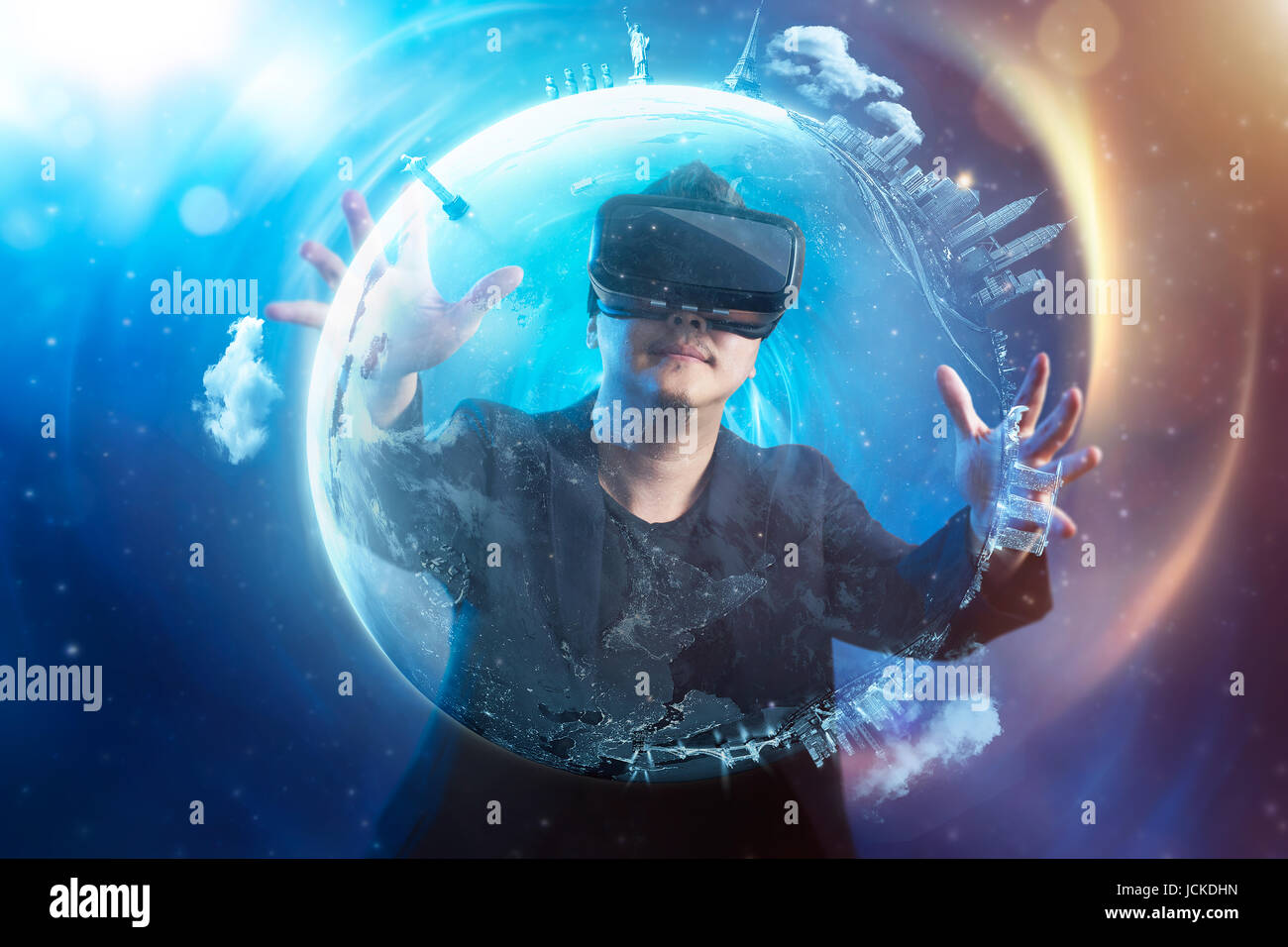 The young man wearing virtual reality goggles with amazing cosmic ...