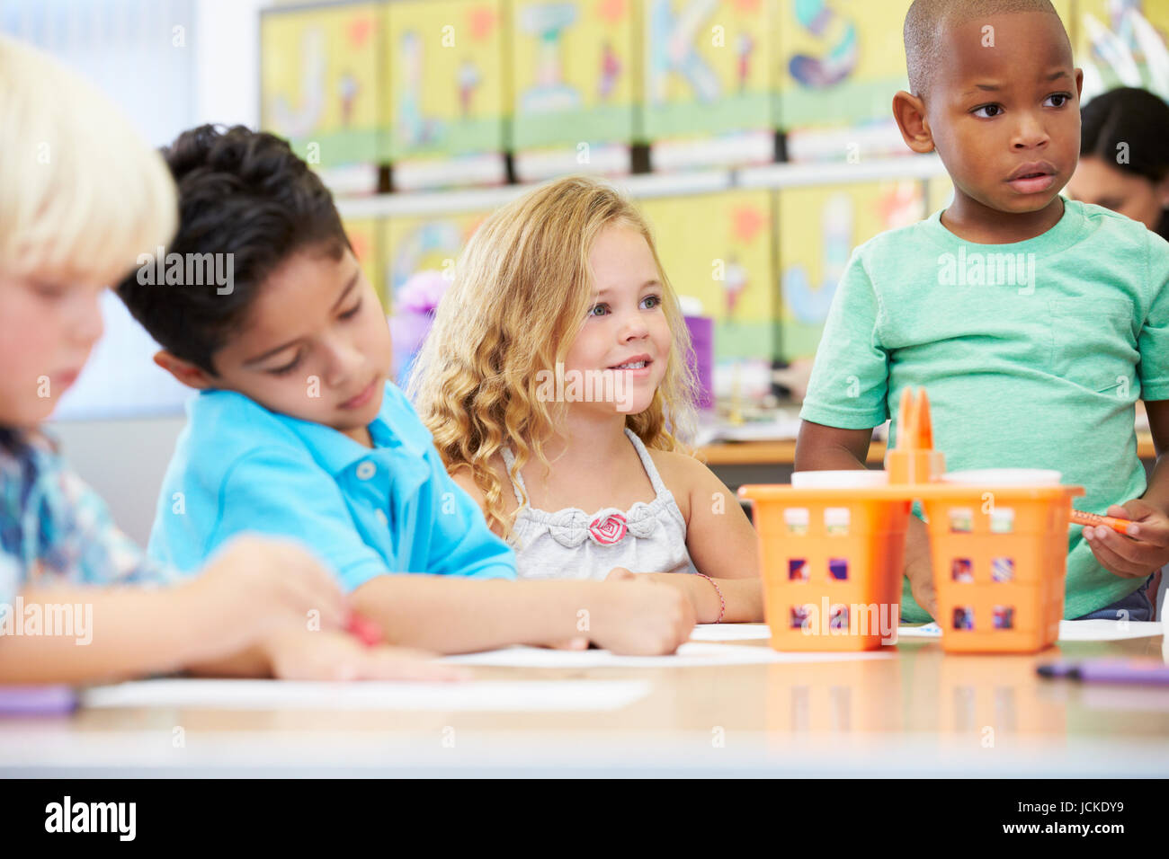 Group Of Elementary Age Children In Art Class With Teacher Stock Photo ...