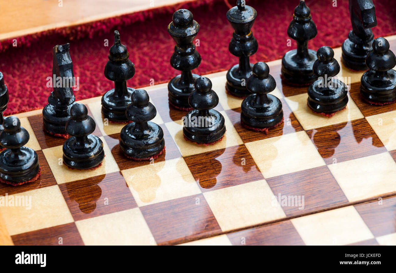Chess pieces on the field Stock Photo - Alamy
