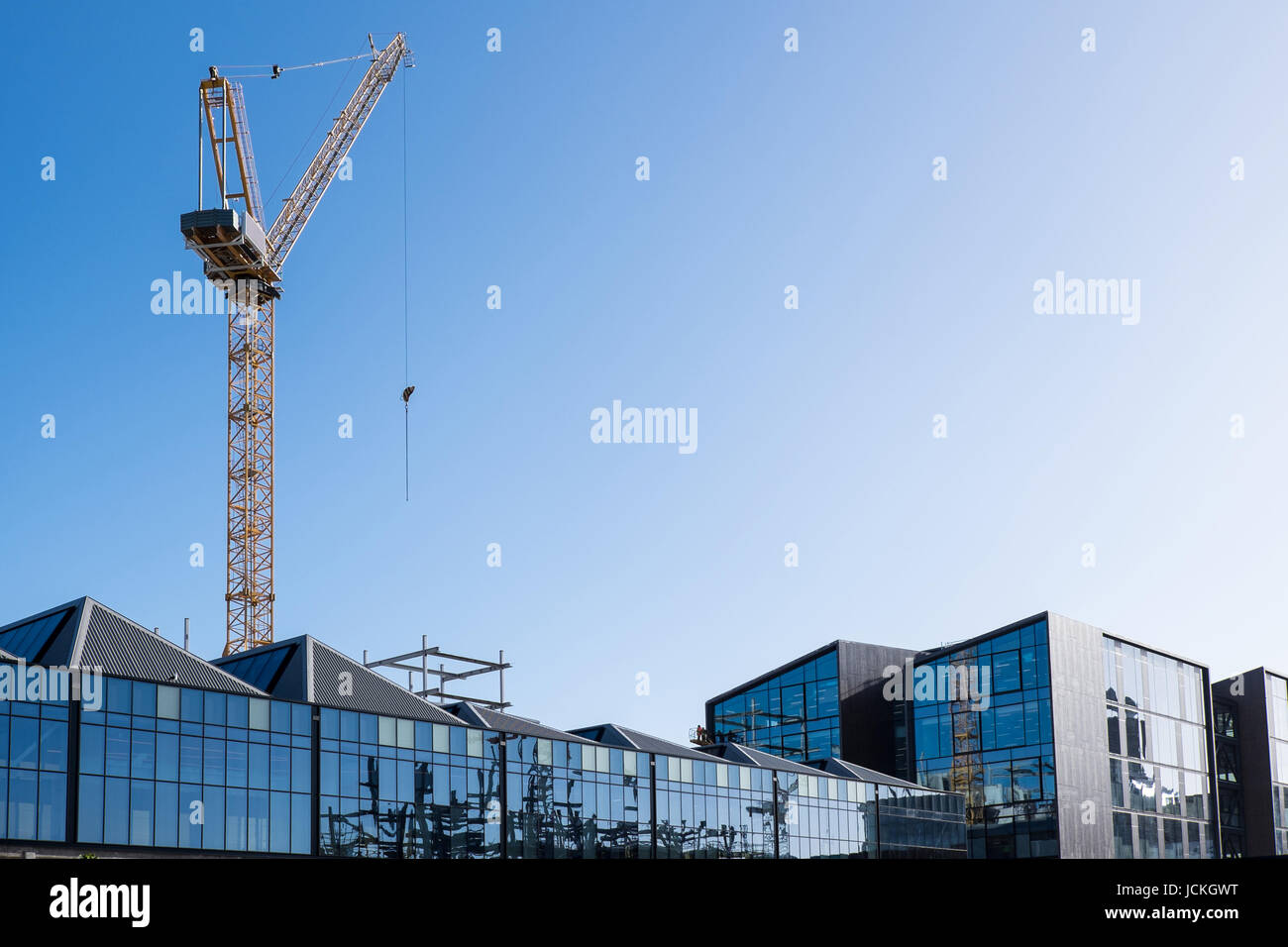 Building construction crane for lowrise glass offices in Wynyard