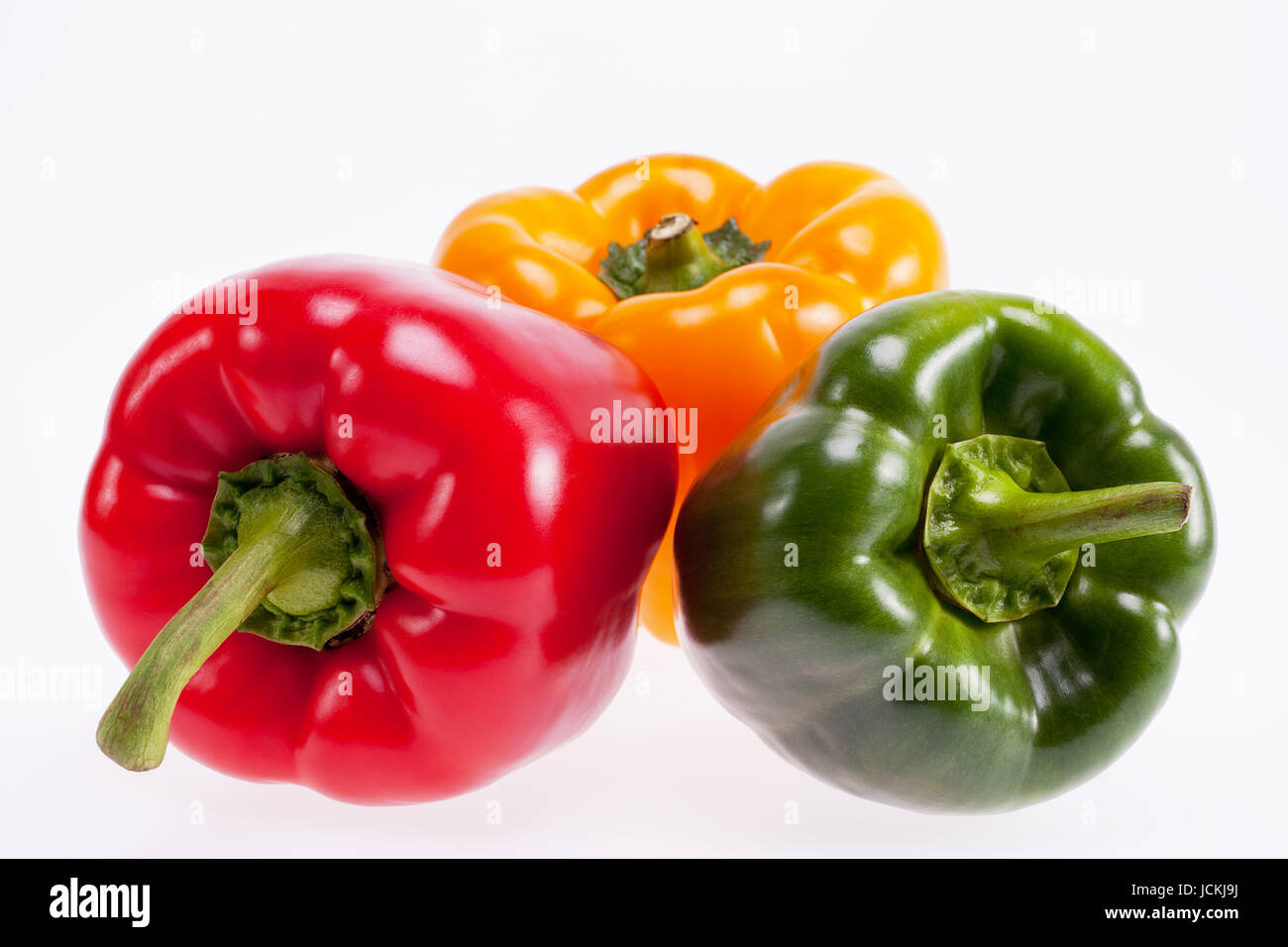colorful peppers isolated on white background Stock Photo - Alamy