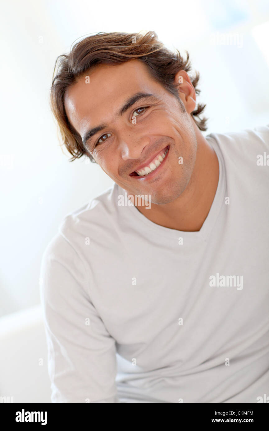 Portrait of smiling handsome man Stock Photo - Alamy