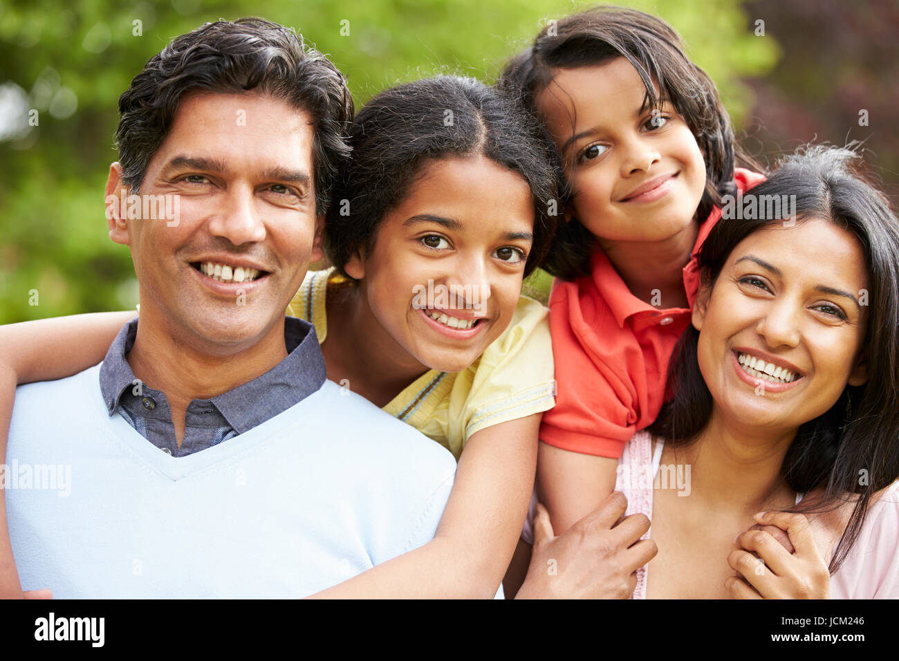 Indian Family Walking In Countryside Stock Photo - Alamy
