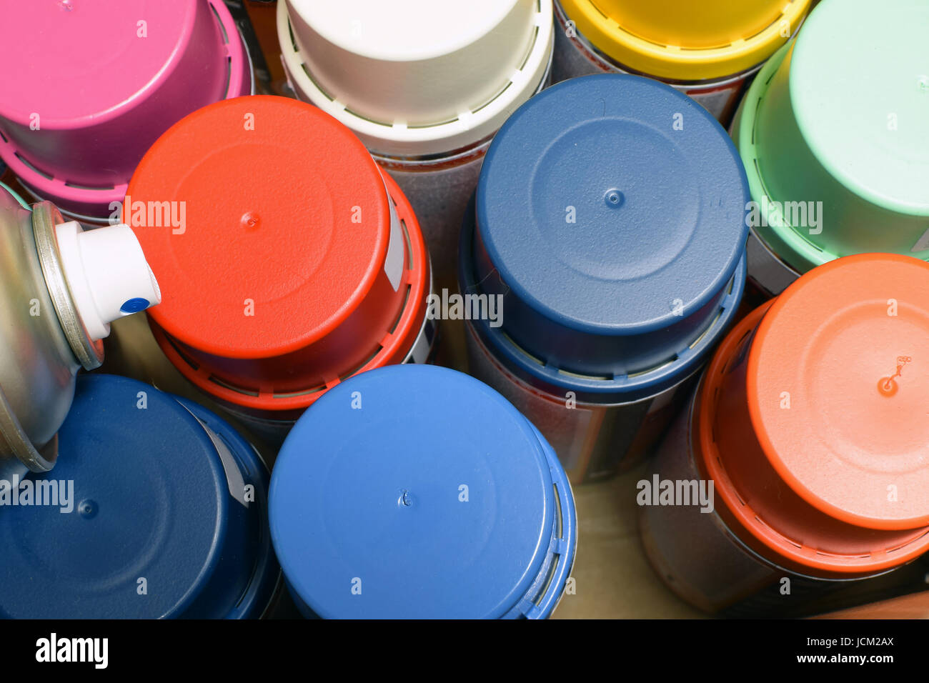 New spray paint cans. Top view Stock Photo