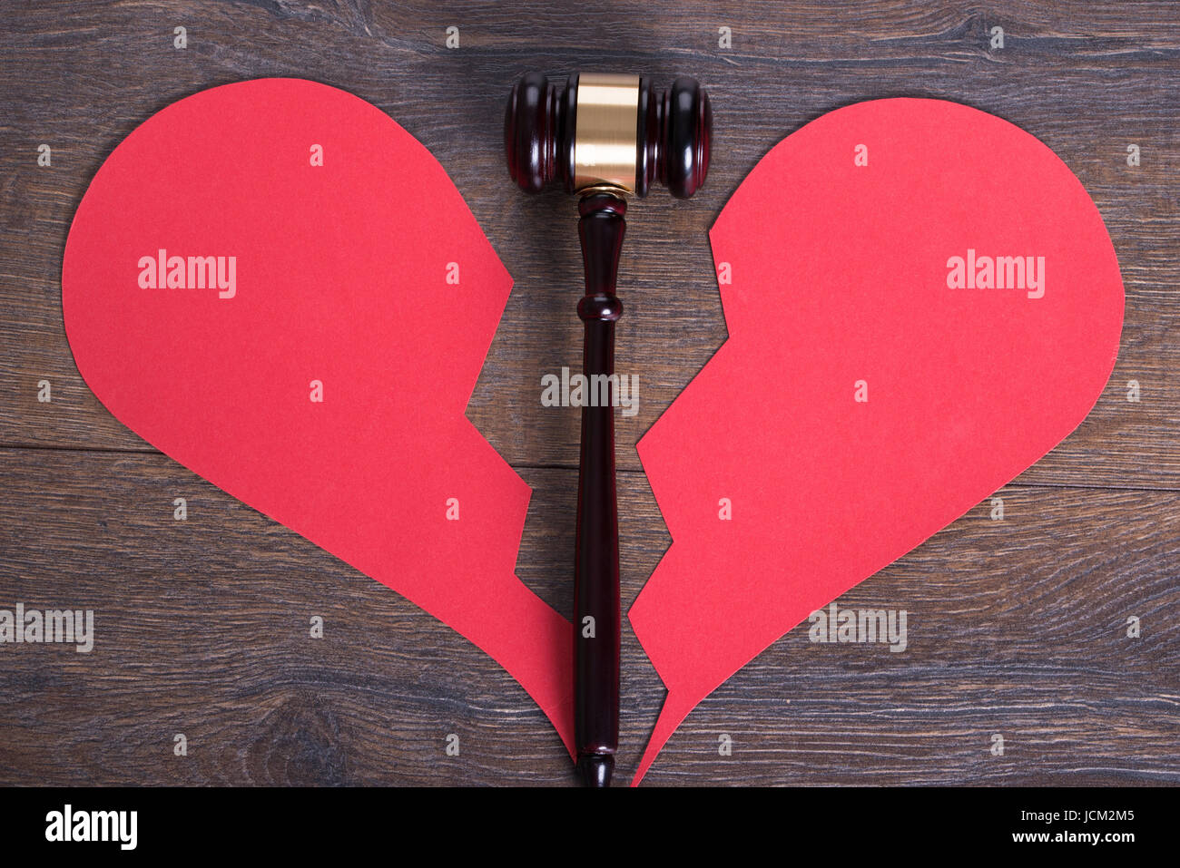 Gavel and broken heart shape in divorce concept Stock Photo