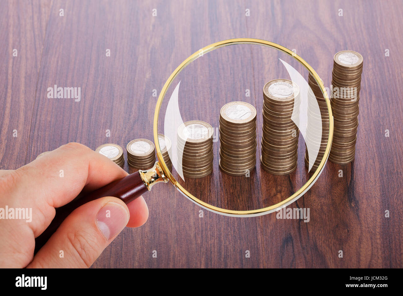 Close up coins magnifying glass hi-res stock photography and images - Page  2 - Alamy