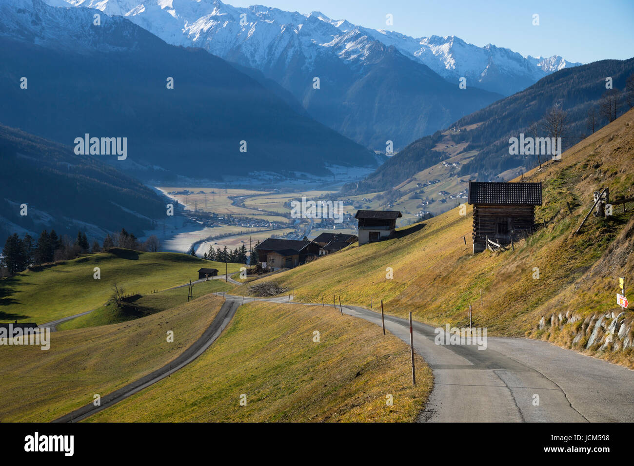 Street reaching into the frozen valley, Pass Thurn, Tirol, Austria Stock Photo