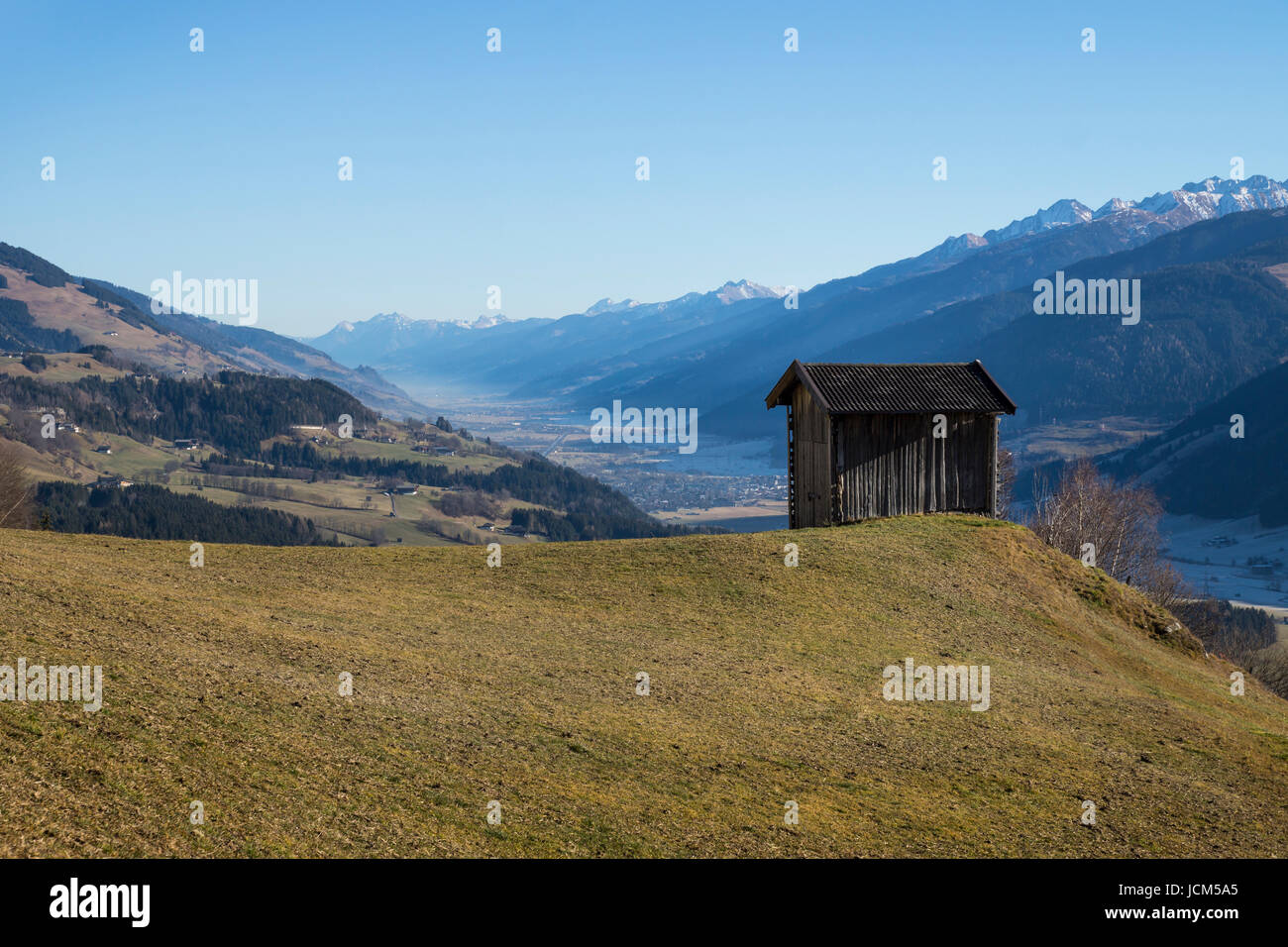 Hut with view on snowy Kitzbueheler Alpen, Tirol, Austria Stock Photo