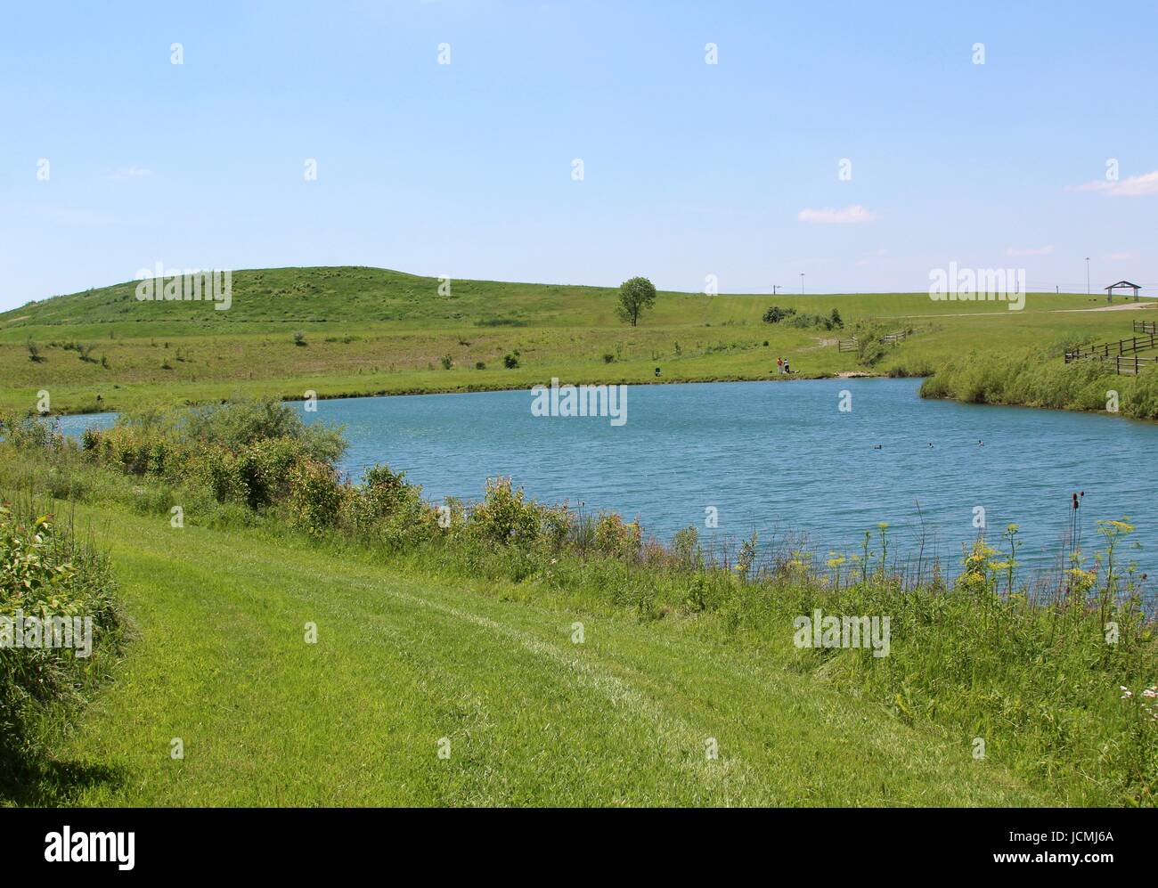 The lake and landscape of the park along with the nature of the day. Stock Photo