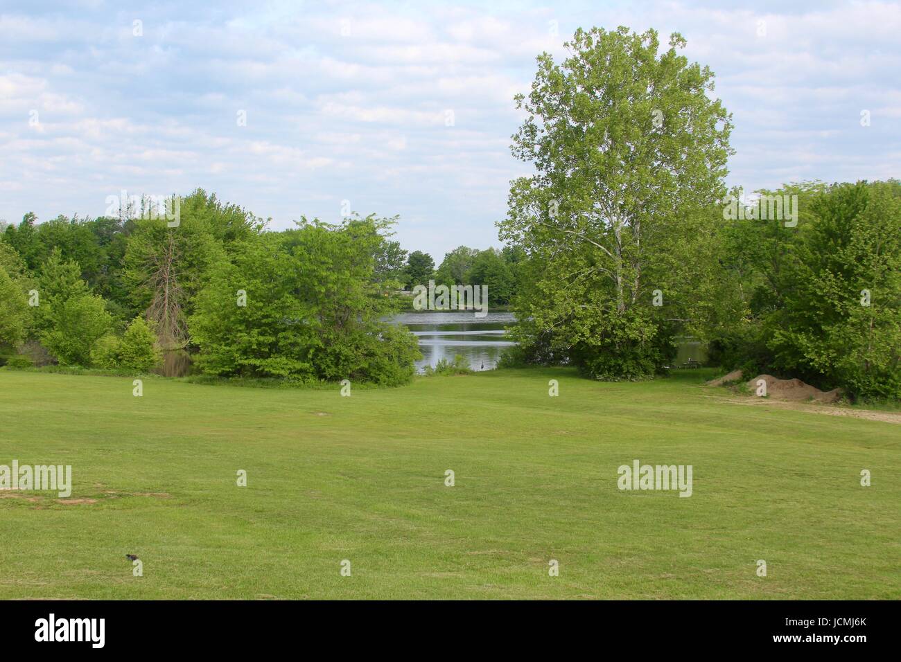 The lake and landscape of the park along with the nature of the day. Stock Photo
