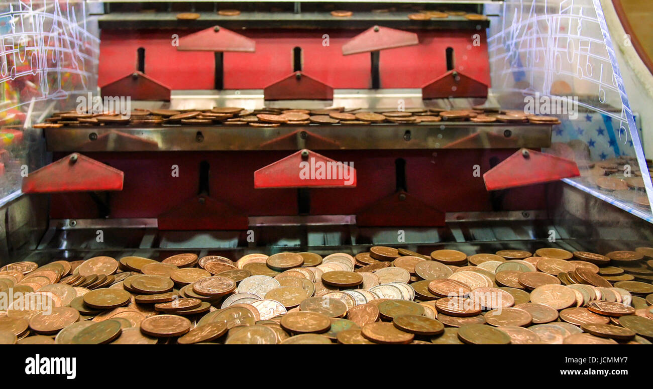 Coin pusher machine hi-res stock photography and images - Alamy