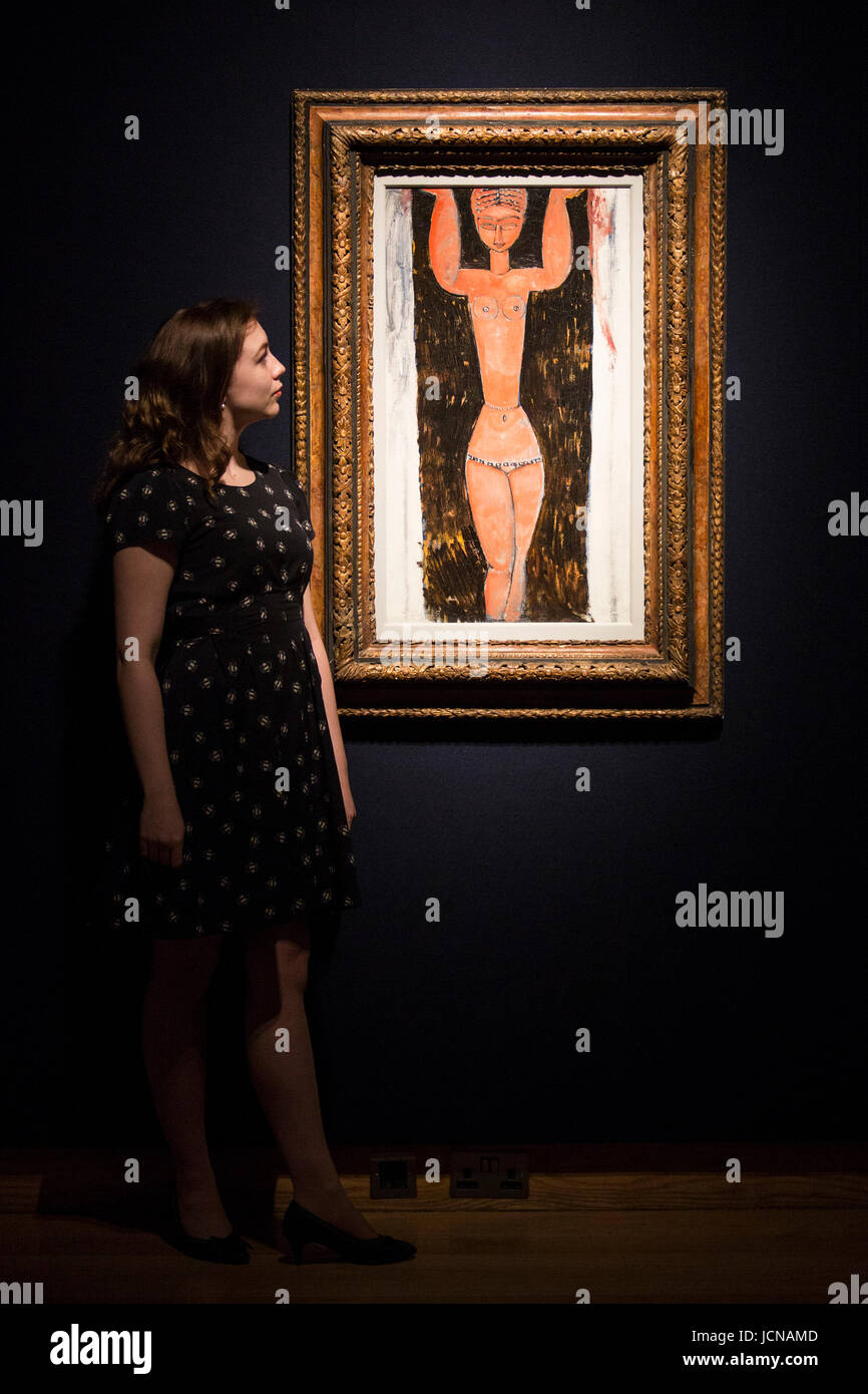 London, UK. 16 June 2017. A Christie's employee looks at the painting Cariatide, 1913, by Amedeo Modigliani, est. GBP 6-9m. Auction house Christie's presents a preview of the Impressionist and Modern Art evening sale on 27 June 2017. The sale is part of 20th Century at Christie's and is led by a group of masterpiece paintings by Max Beckmann, Claude Monet, Pablo Picasso, Egon Schiele and Vincent van Gogh. Stock Photo