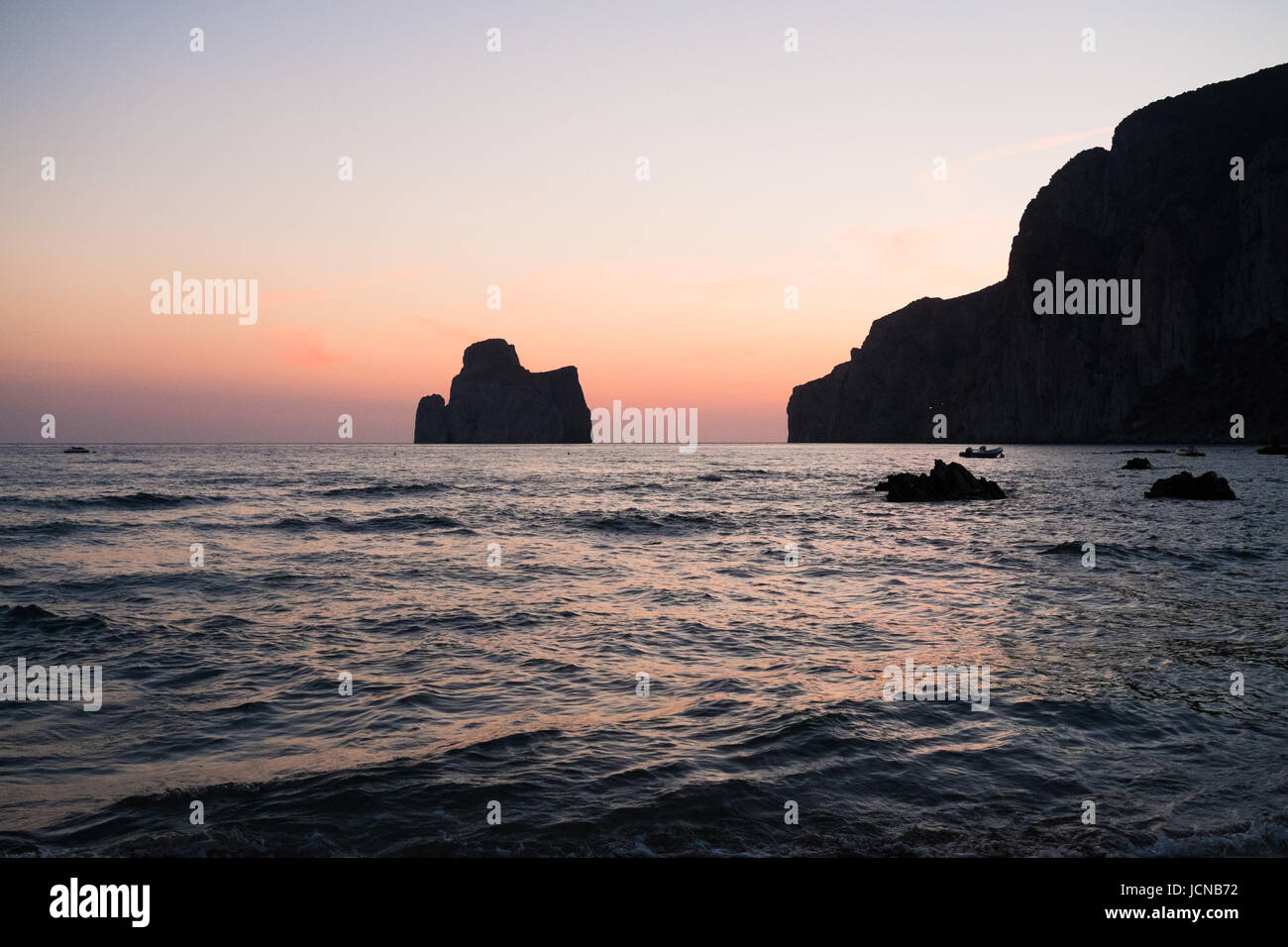 Sunset on the Beach of Masua, Iglesias, Sud Sardegna province, Sardinia,  Italy, Europe Stock Photo - Alamy