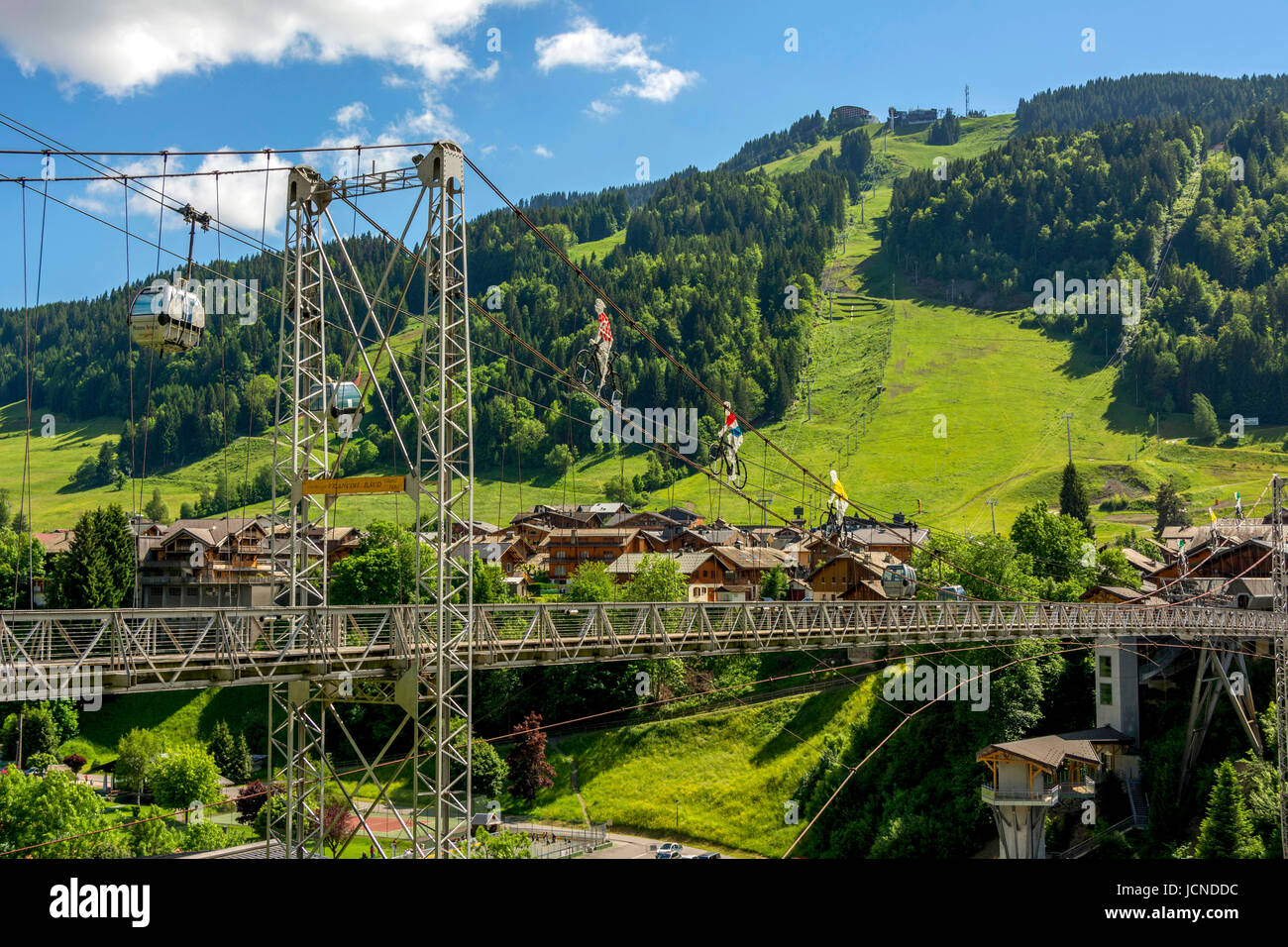 Footbridge Francois Baud and cable car in Morzine village. Haute Savoie. France. Europe Stock Photo