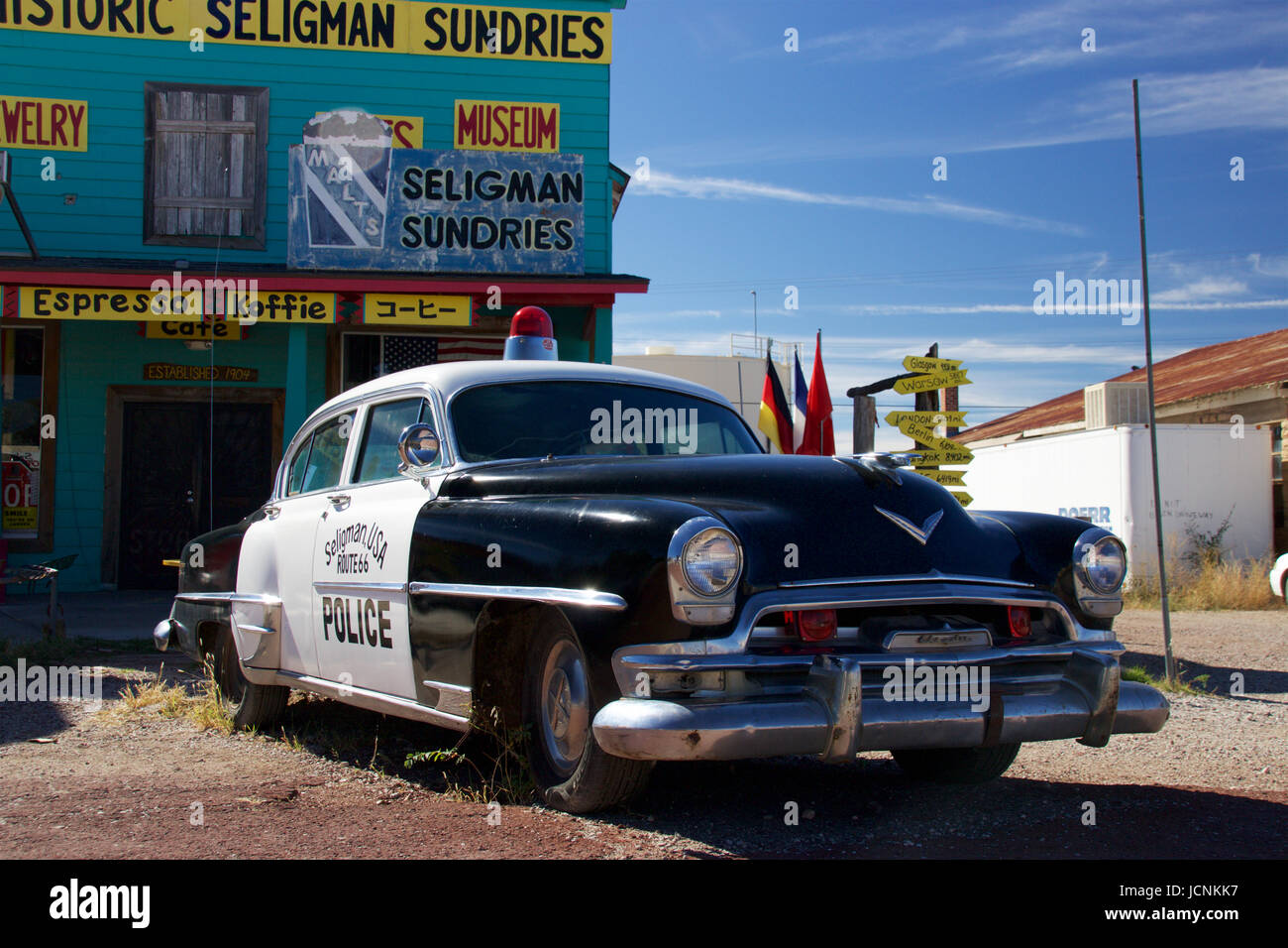 Chrysler Police Car in front of Historic Seligman Sundries Cafe along