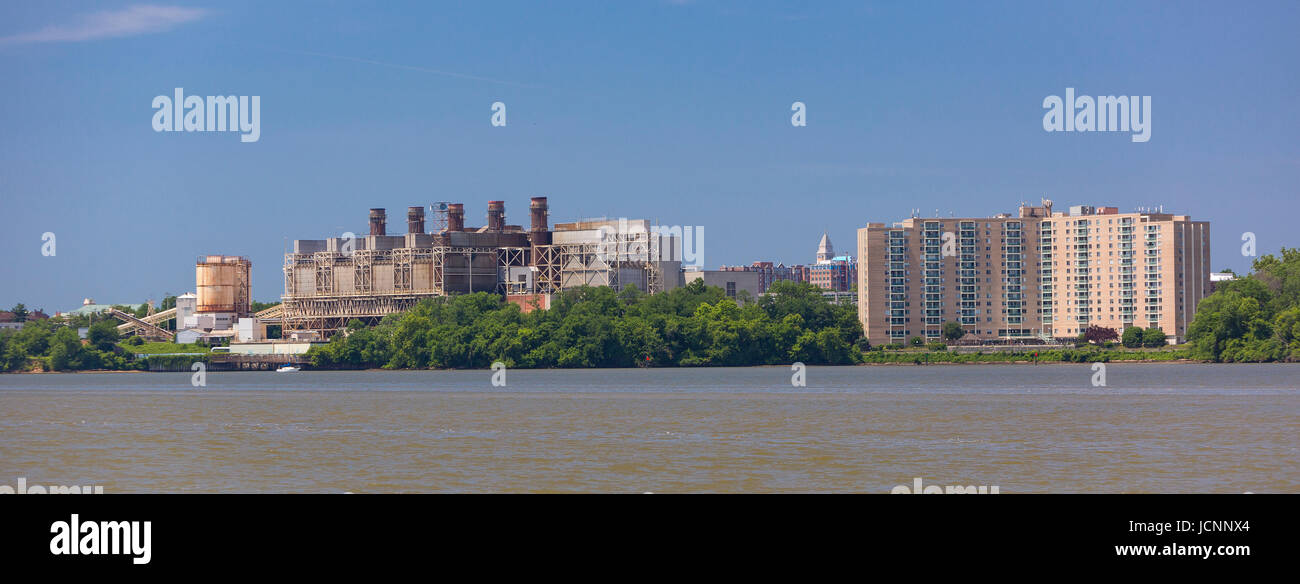 ALEXANDRIA, VIRGINIA, USA - PRGS, at left, the Potomac River Generating Station, a former coal burning electrical power plant, on Potomac River. Marin Stock Photo