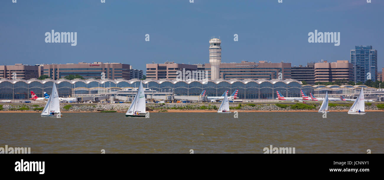 VIRGINIA, USA - Reagan National Airport, DCA, on the Potomac RIver, and sailboats. Stock Photo