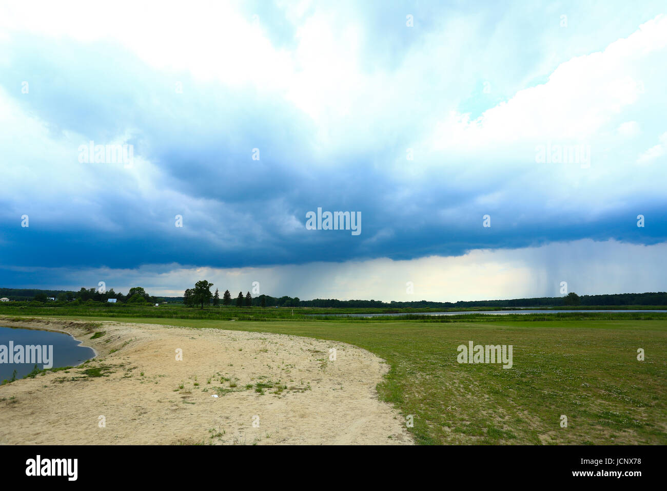 Grzegorzewice, Poland. 16th Jun, 2017. Partly cloudy weather turns into rain and thunderstorm. Credit: Madeleine Ratz/Alamy Live News Stock Photo