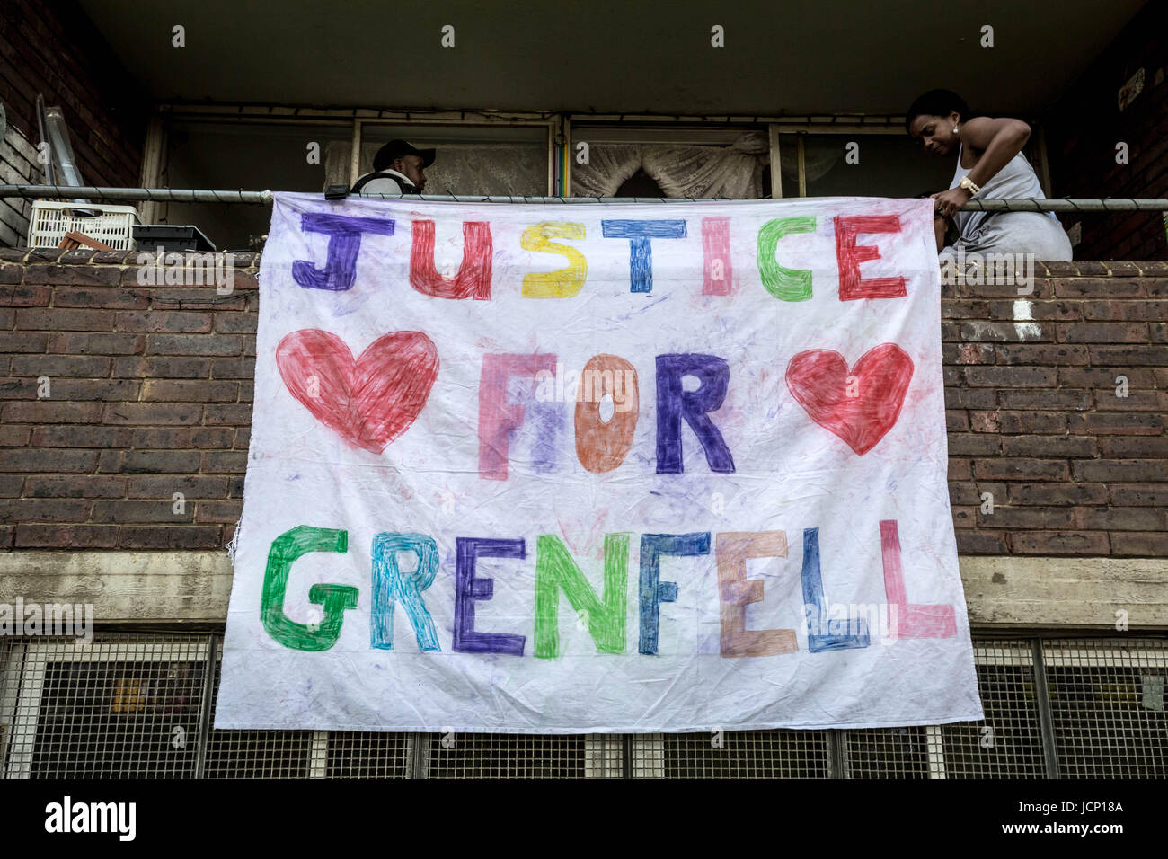 London, UK. 16th June, 2017. ‘Justice For Grenfell’ banner is hung from neighbouring Lancaster West housing estate. © Guy Corbishley/Alamy Live News Stock Photo