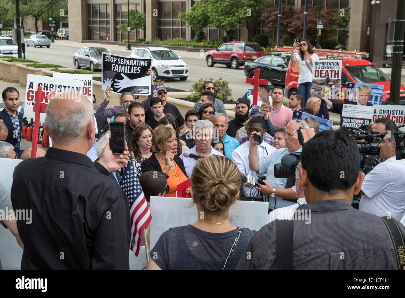 Detroit, Michigan, USA. 16th June, 2017. Members of Detroit's Chaldean community of Iraqi Christians protest the government's arrest of dozens of Iraqis who they plan to deport. Family members say that Iraqi Christians face genocide if they are returned to Iraq. Congresswoman Brenda Lawrence (D-Michigan) speaks against the deportations. Credit: Jim West/Alamy Live News Stock Photo